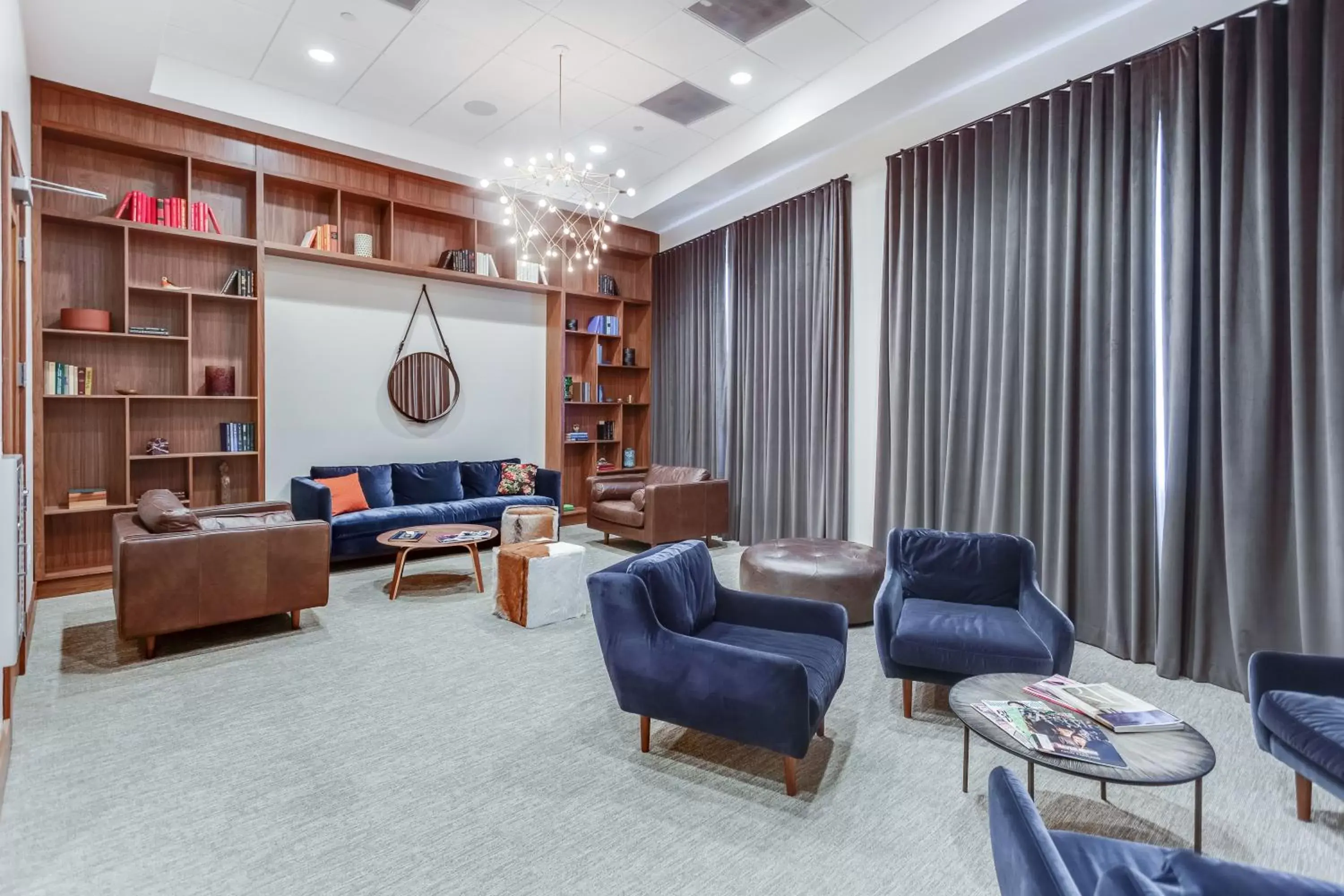 Communal lounge/ TV room, Seating Area in Dadeland Towers by Miami Vacations