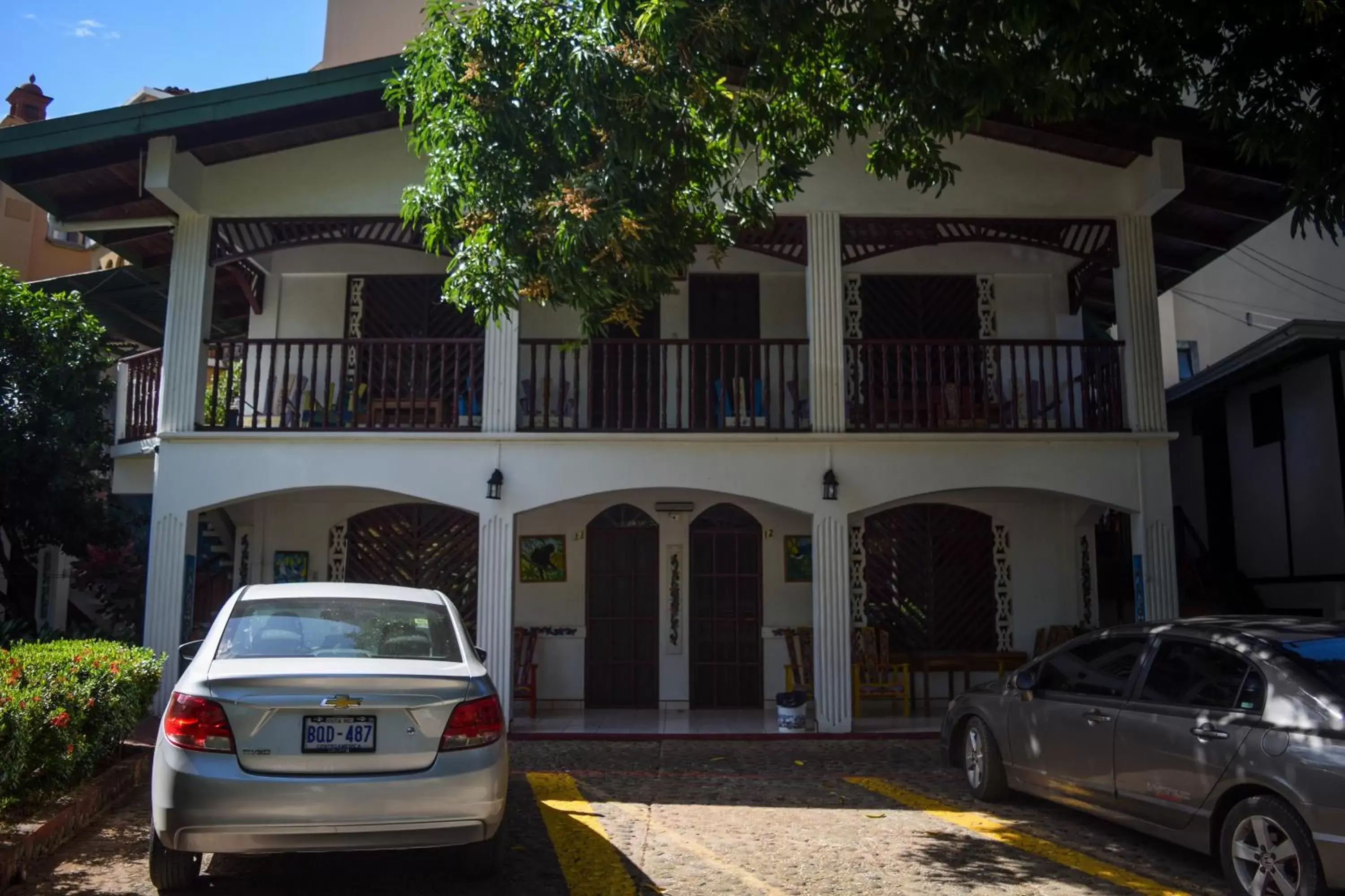 Parking, Property Building in Hotel Marielos