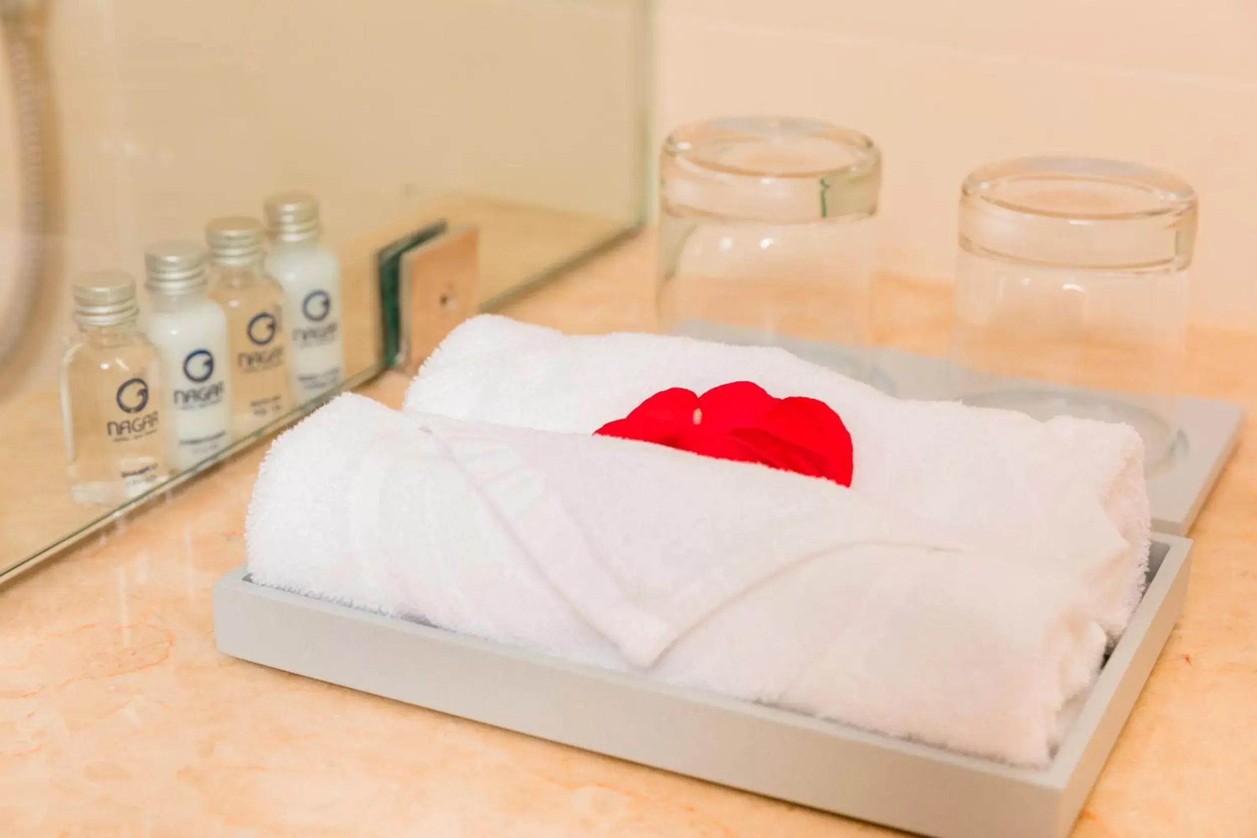 towels, Bed in Nagar Hotel Nha Trang