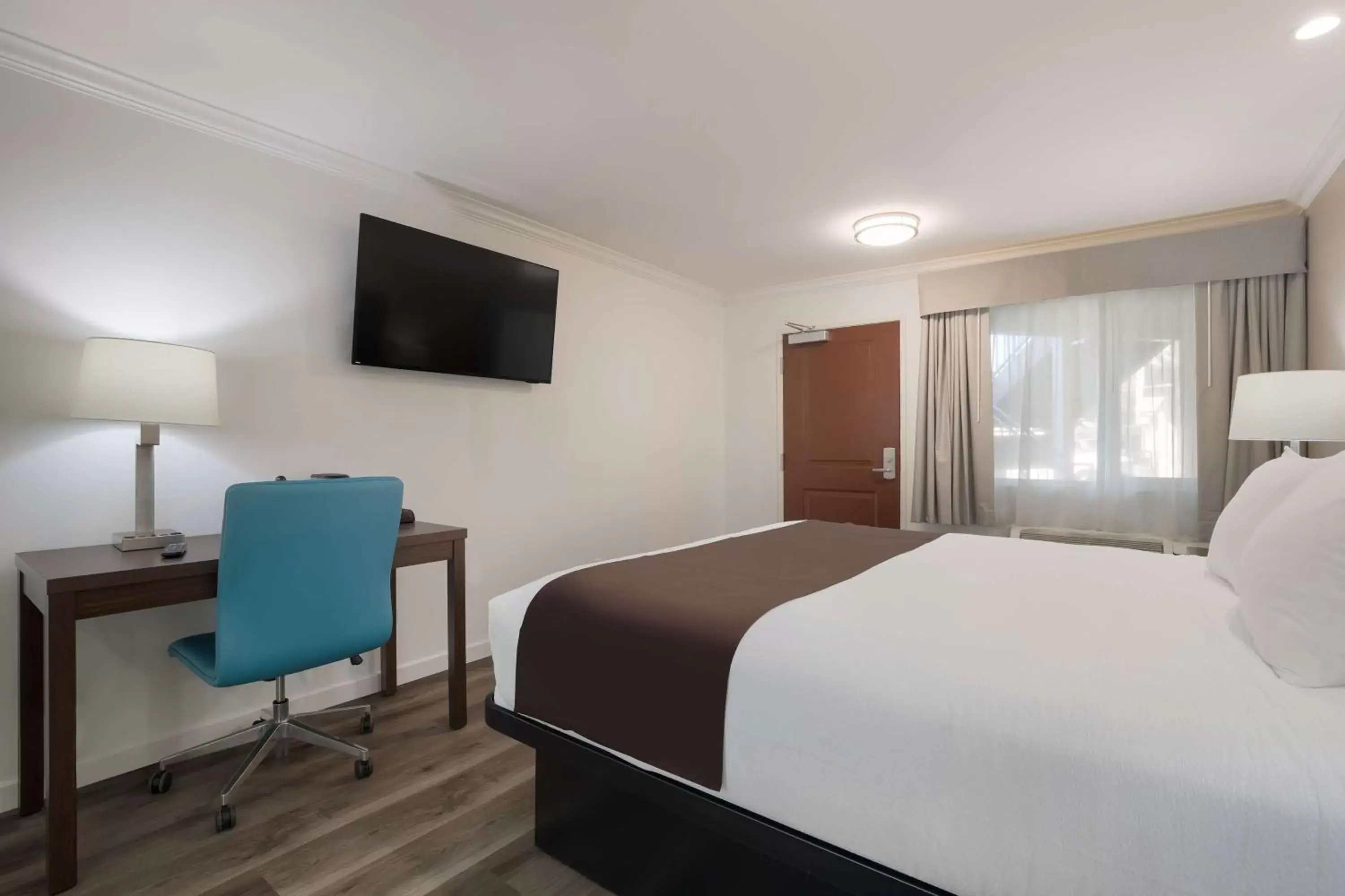 Bedroom, Bed in SureStay Plus Hotel by Best Western Upland - Ontario North