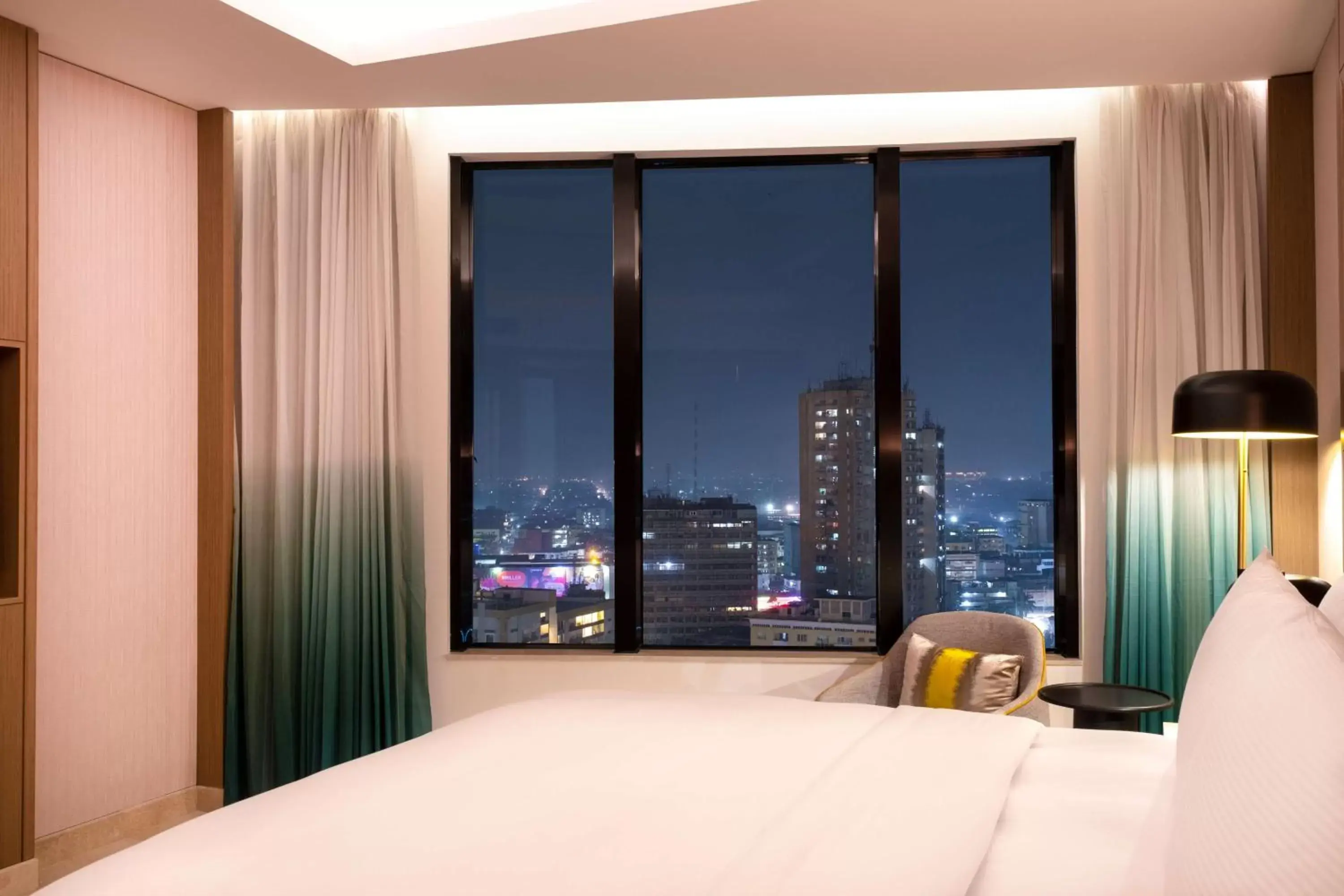 Bed, City View in Hilton Kinshasa