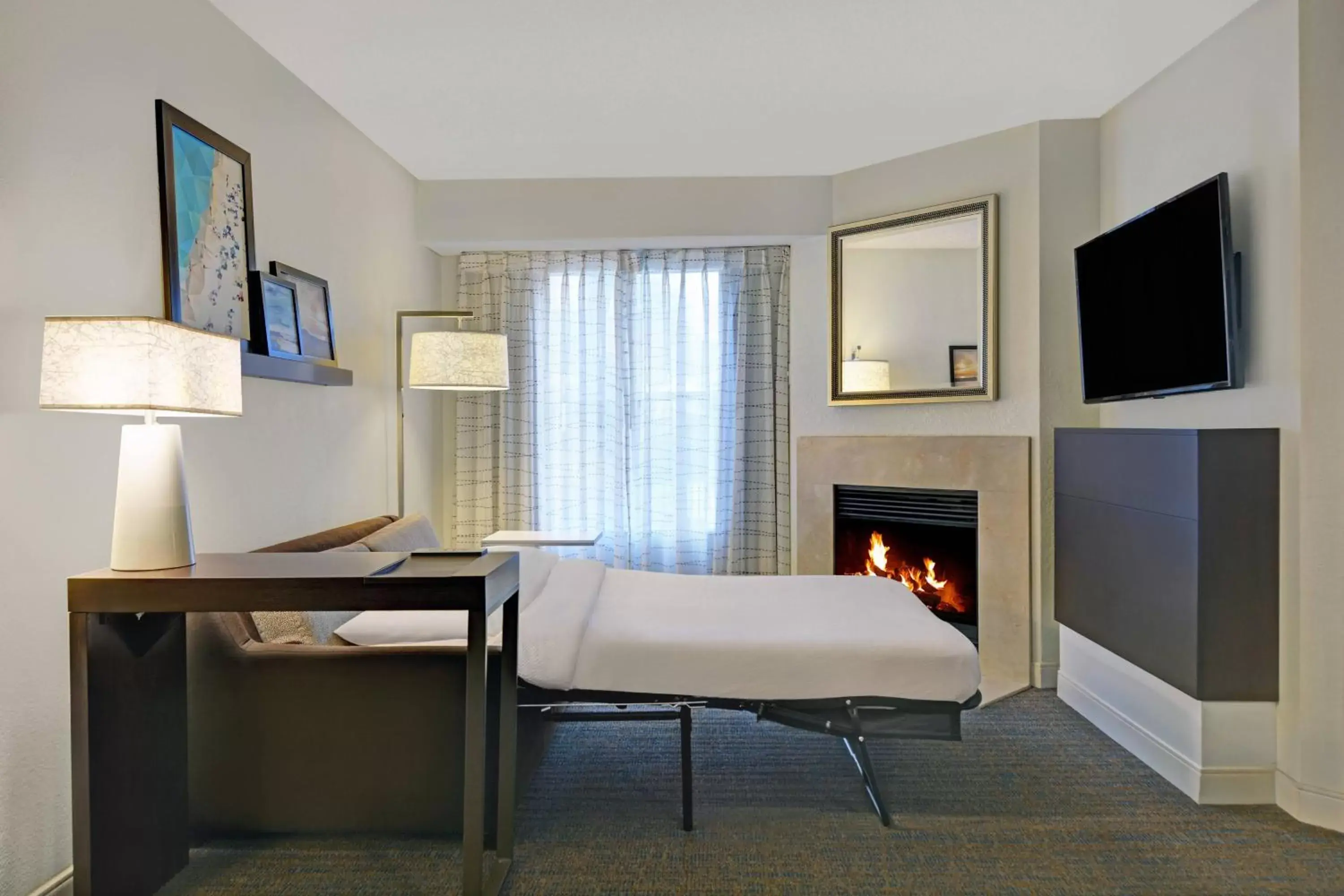 Bedroom, TV/Entertainment Center in Residence Inn by Marriott Jacksonville Butler Boulevard