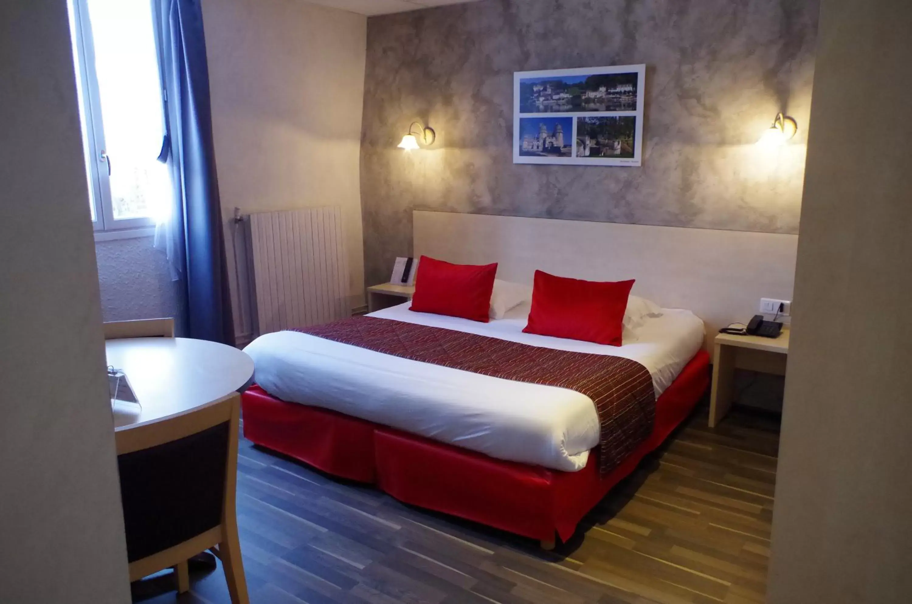 Photo of the whole room, Bed in Logis Hotel Beaudon