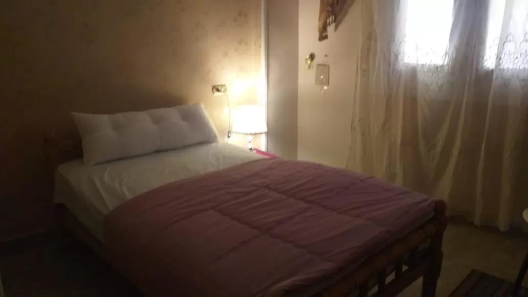 Bed in pyramid Giza city inn