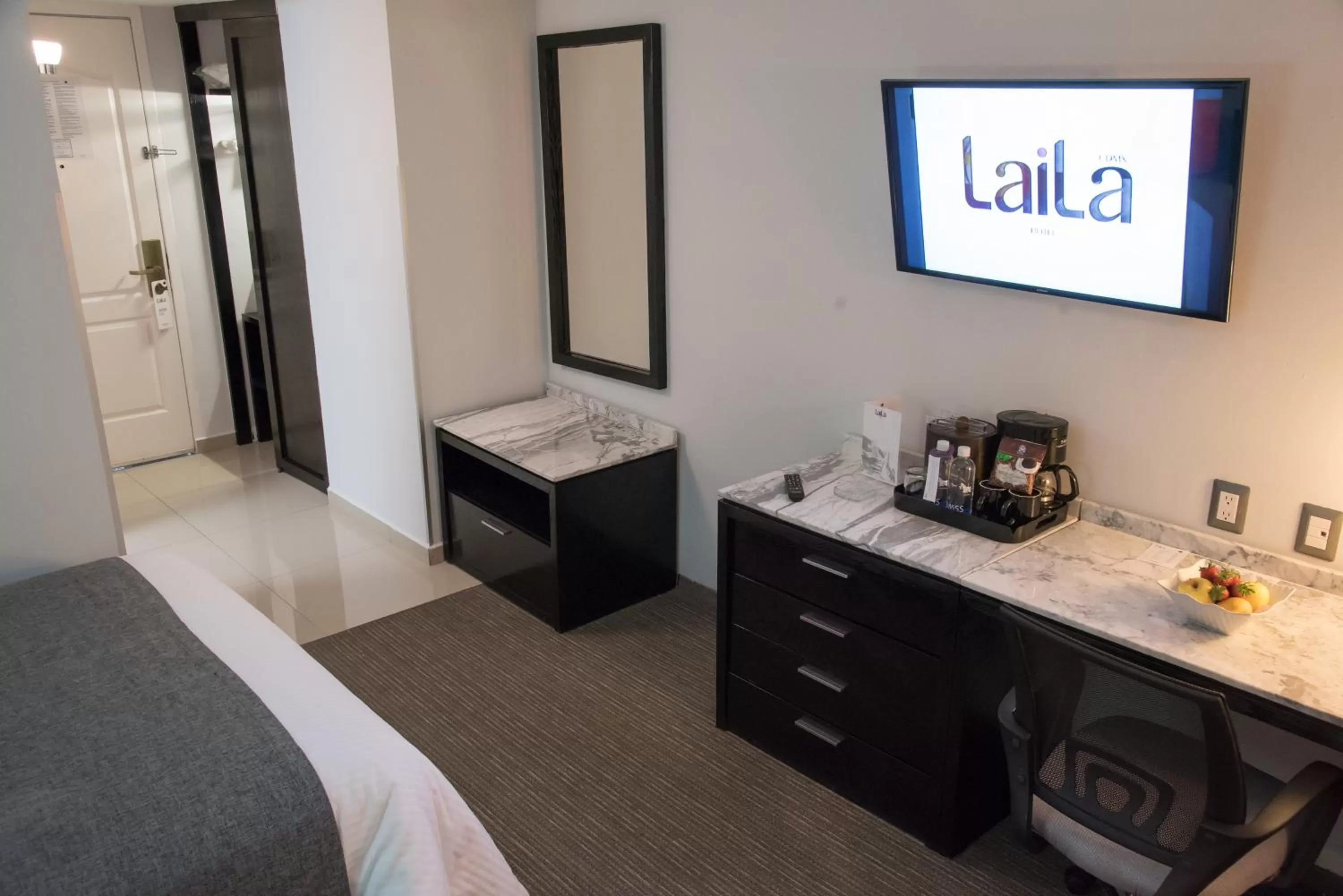 Seating area, Bed in LaiLa Hotel CDMX Reforma