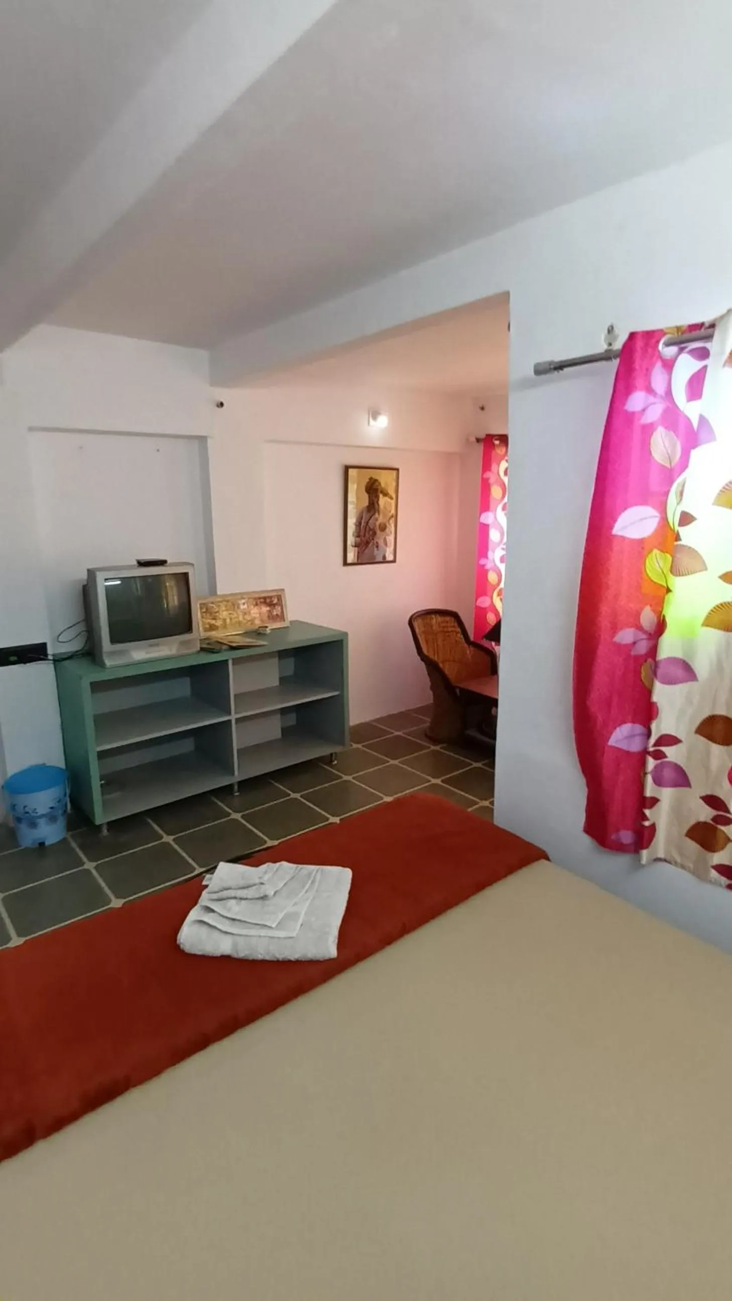 Photo of the whole room, Bed in Jag Niwas Guest House & pure veg restaurant