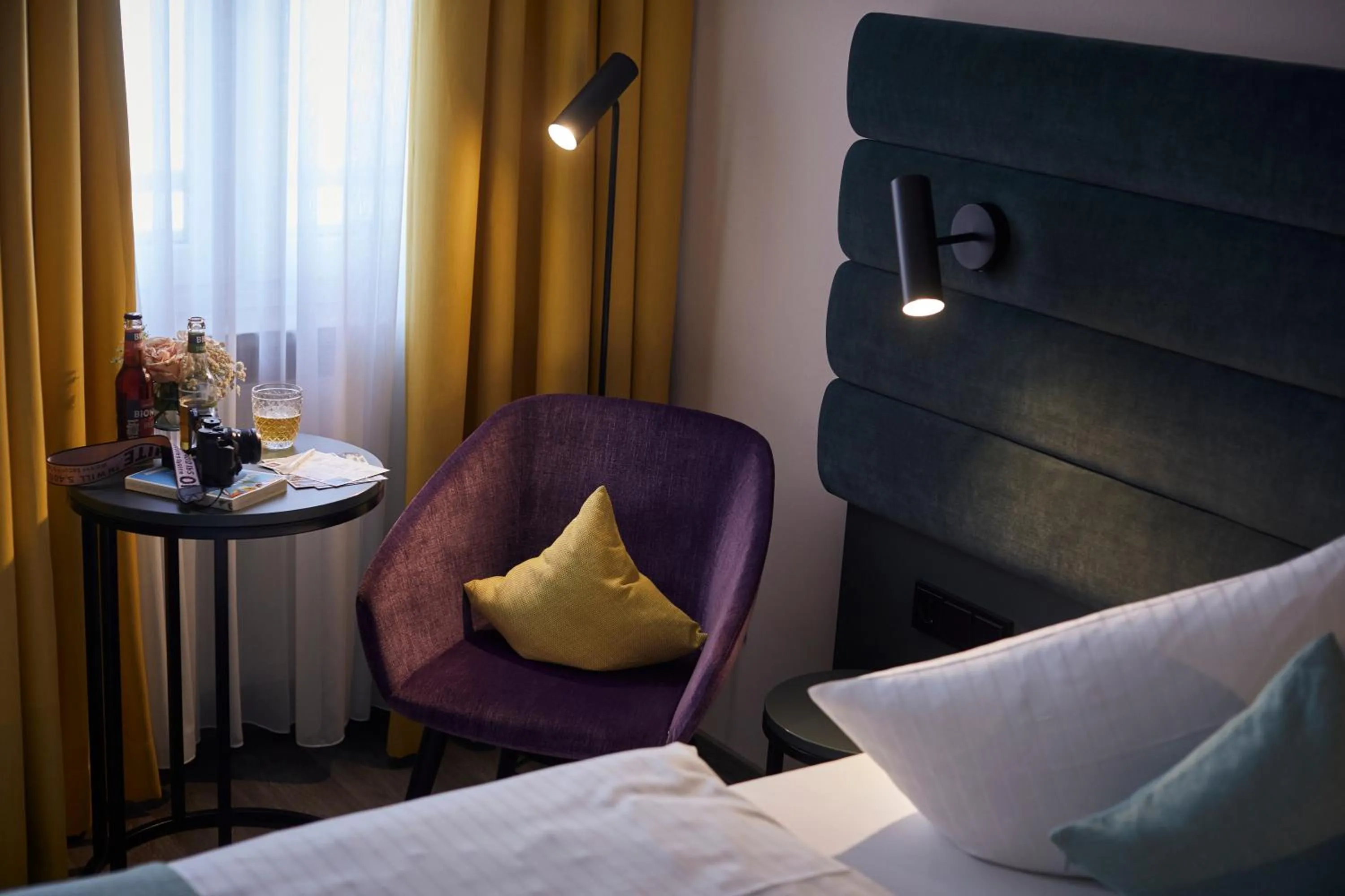 Living room, Bed in Hotel Mirabell by Maier Privathotels