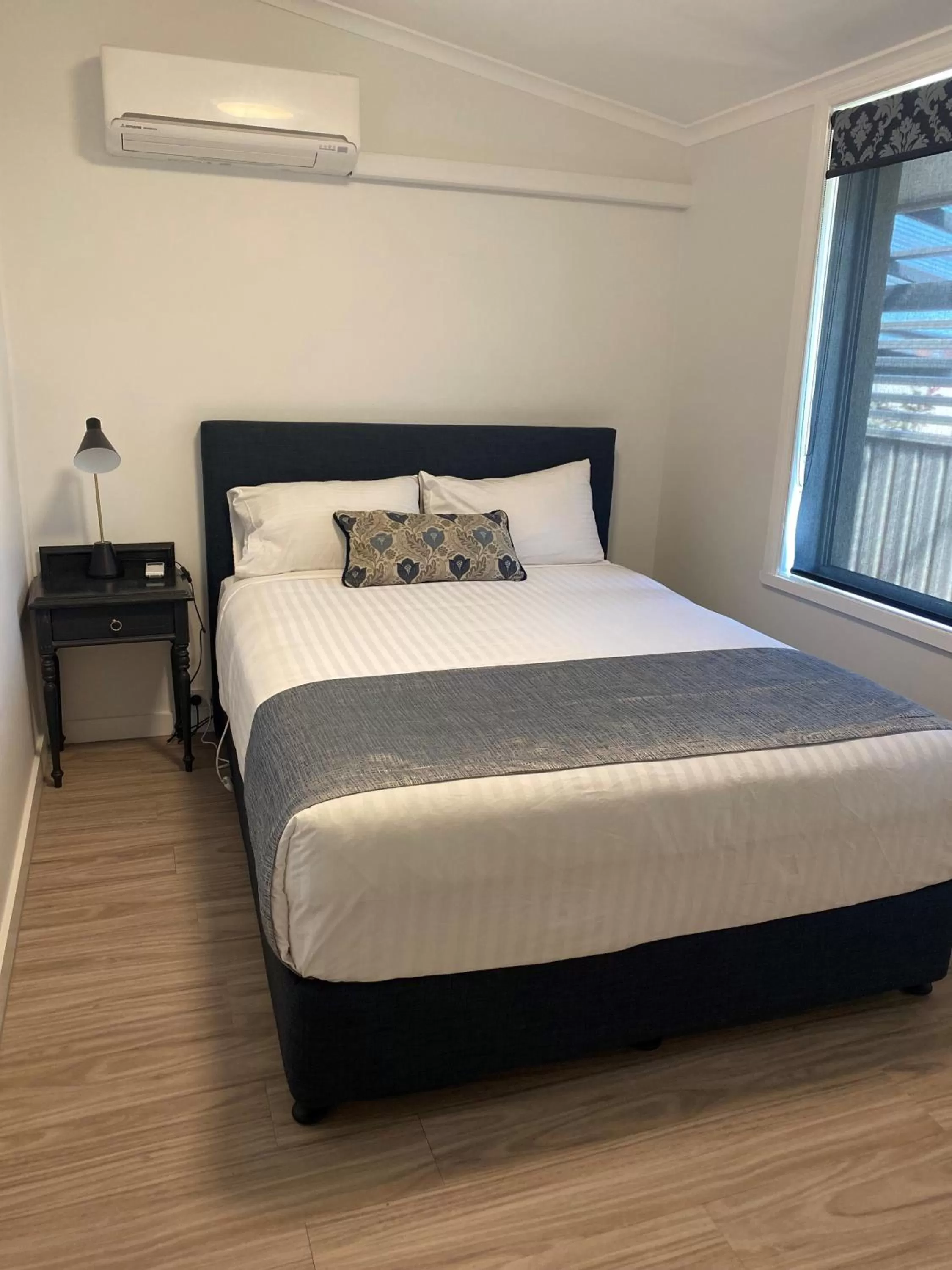 Bed in New England Motor Lodge