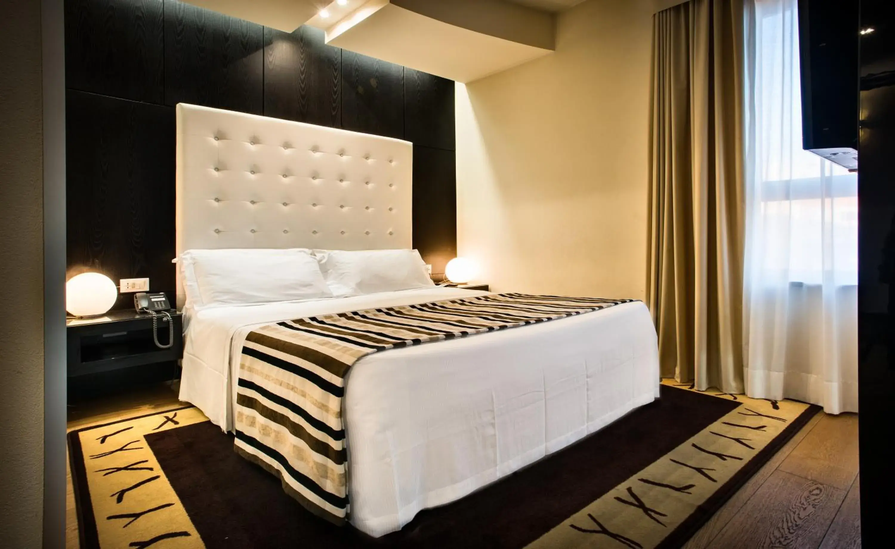 Bedroom, Bed in Sardegna Hotel - Suites & Restaurant