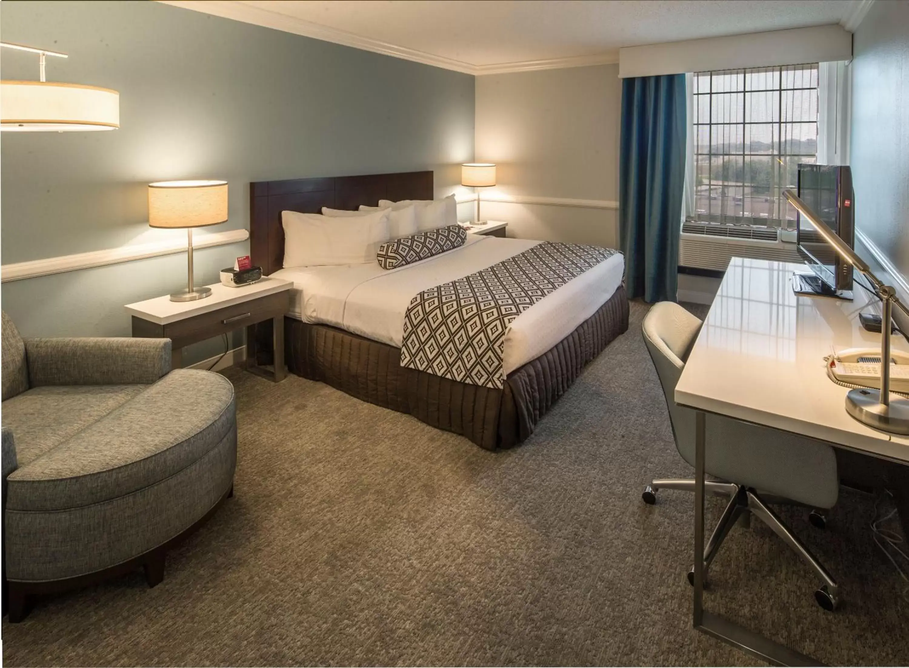 Photo of the whole room, Bed in Crowne Plaza Hotel and Suites Pittsburgh South, an IHG Hotel
