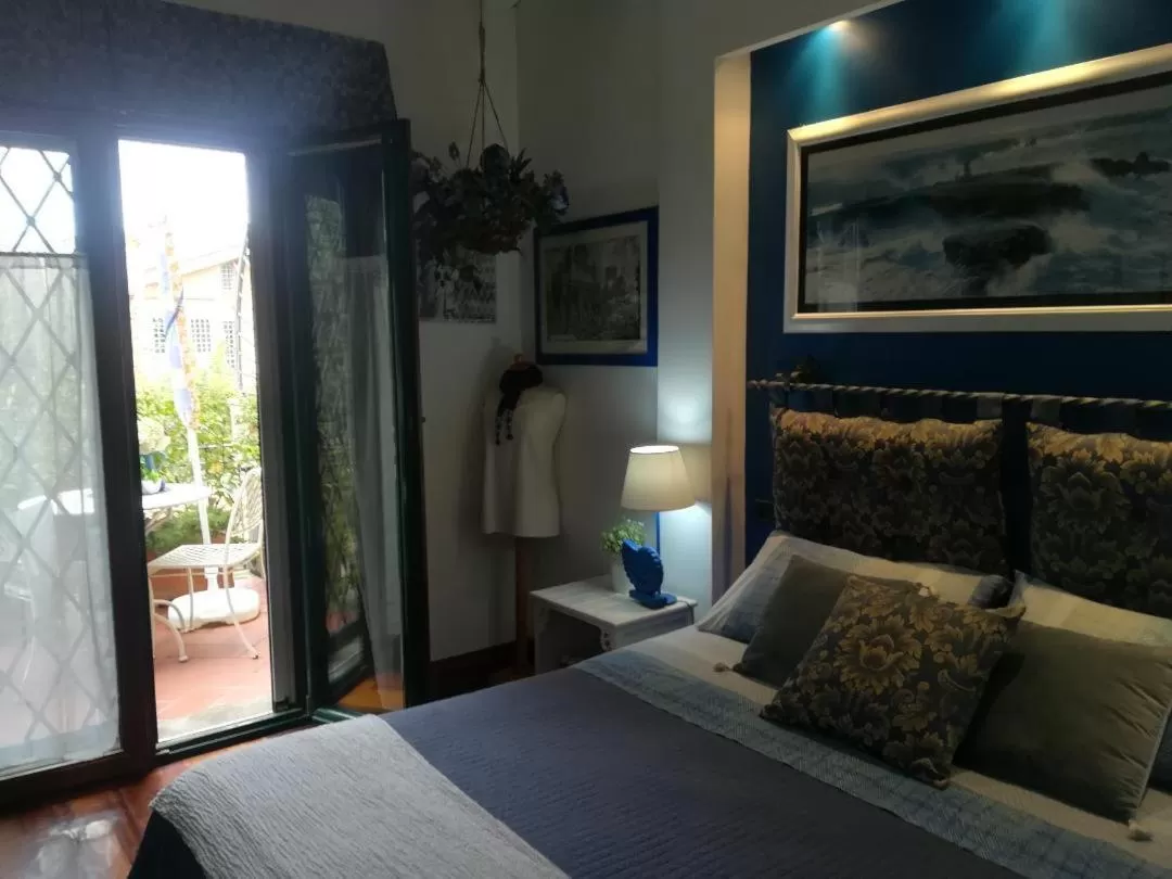 Pool view, Bed in B&B Le Lanterne