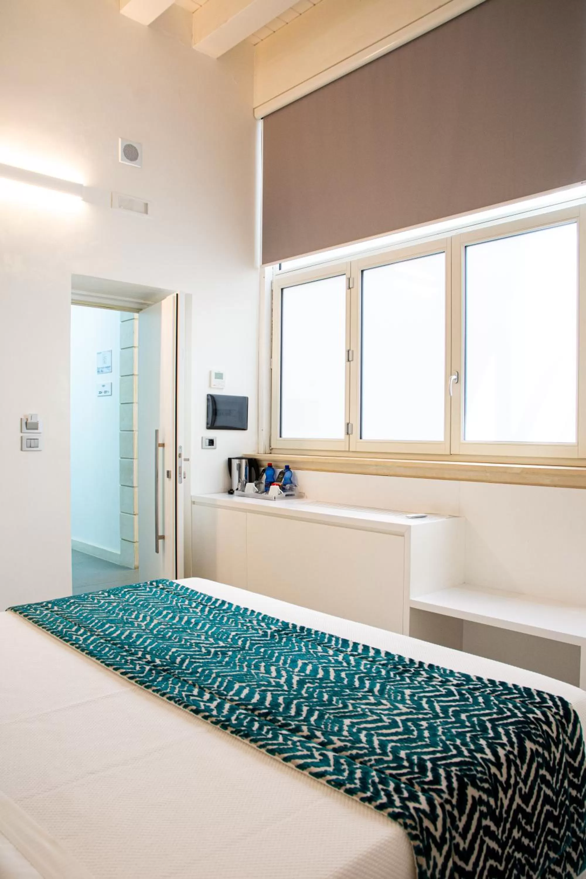 Bedroom in Caportigia Boutique Hotel