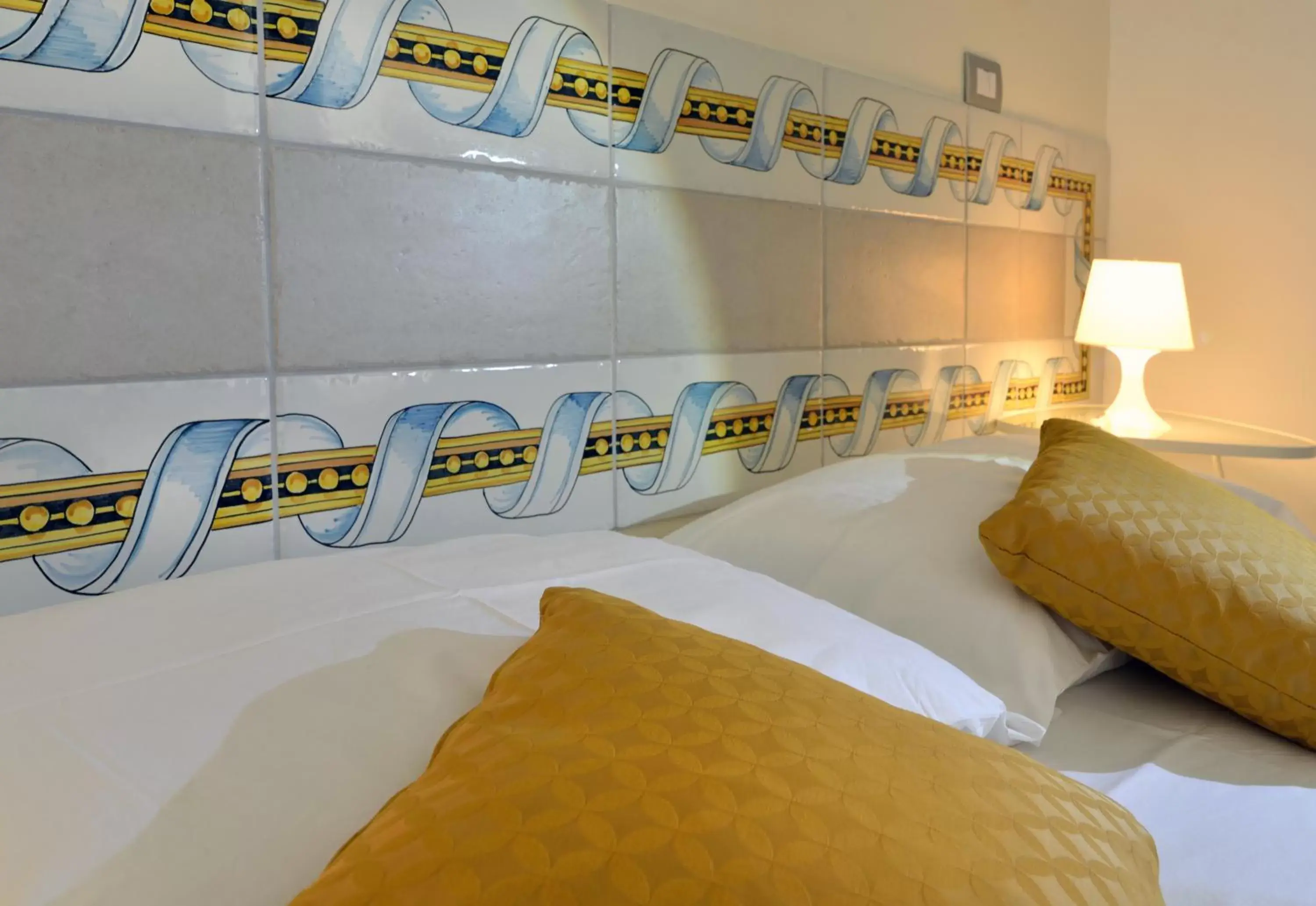 Decorative detail, Bed in Santi e Saraceni Rooms Decorative detail, Bed in Santi e Saraceni Rooms