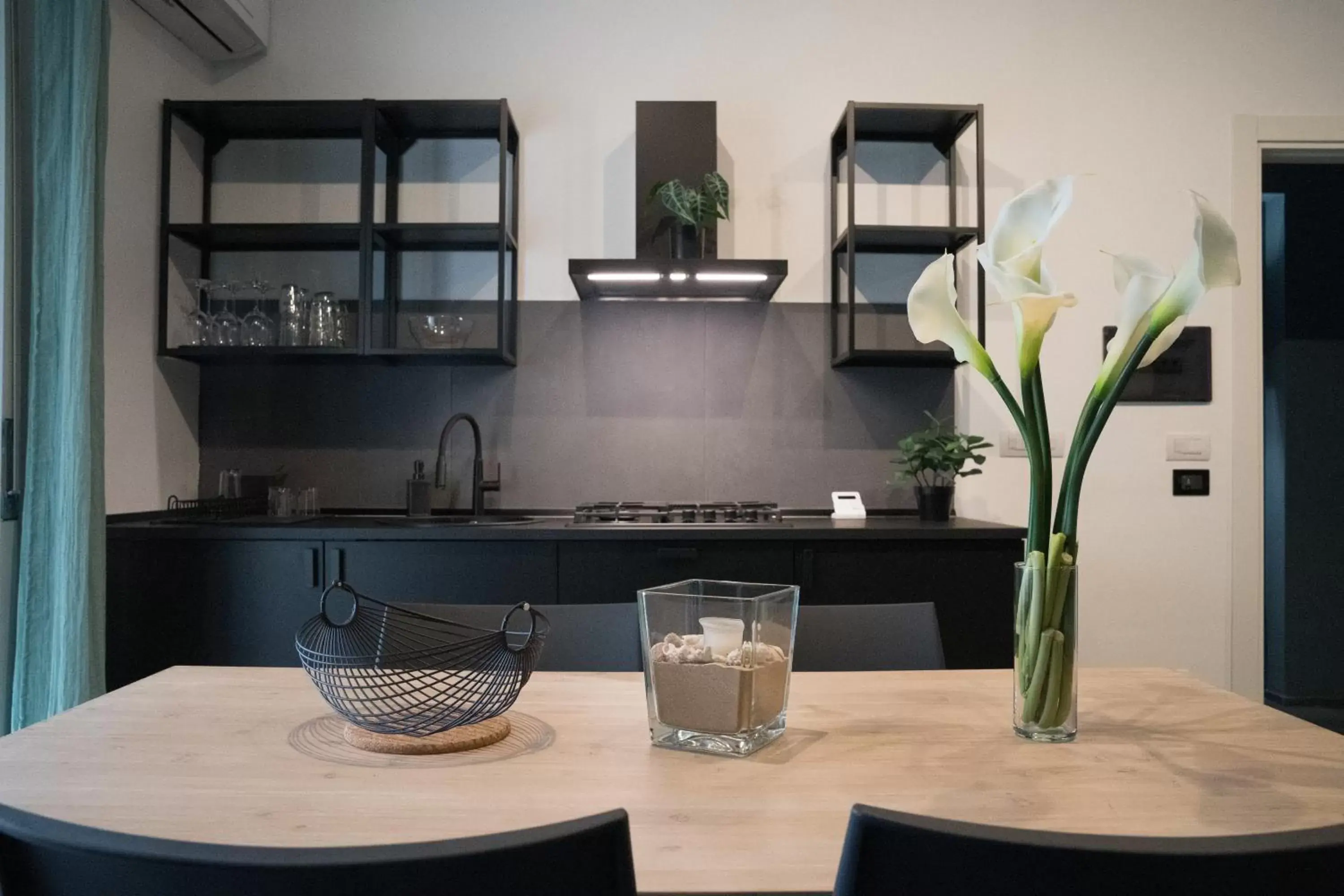 Kitchen/Kitchenette in Oktò apartments Milazzo