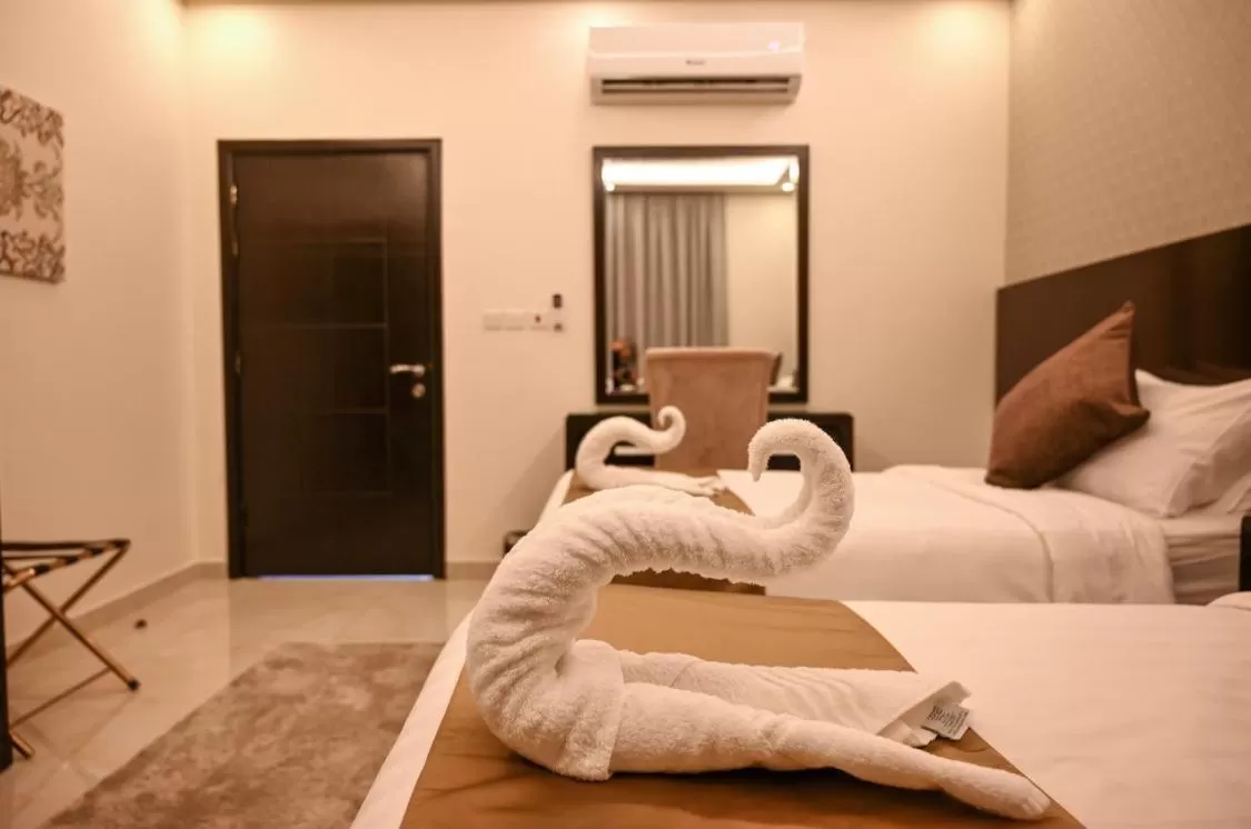 Bed in The Artisan Hotel-Suits