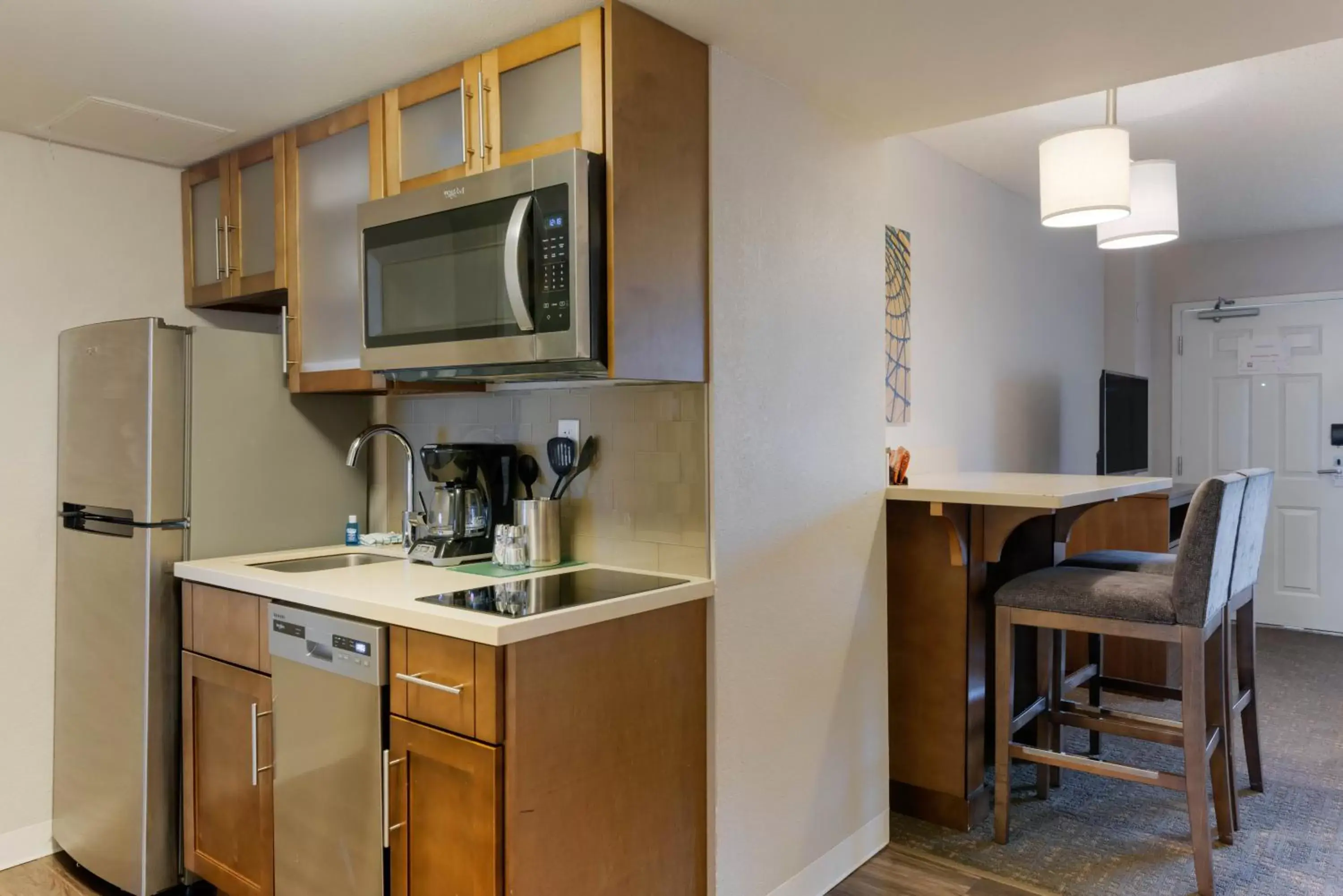 Photo of the whole room, Kitchen/Kitchenette in Staybridge Suites Orlando Royale Parc Suites, an IHG Hotel