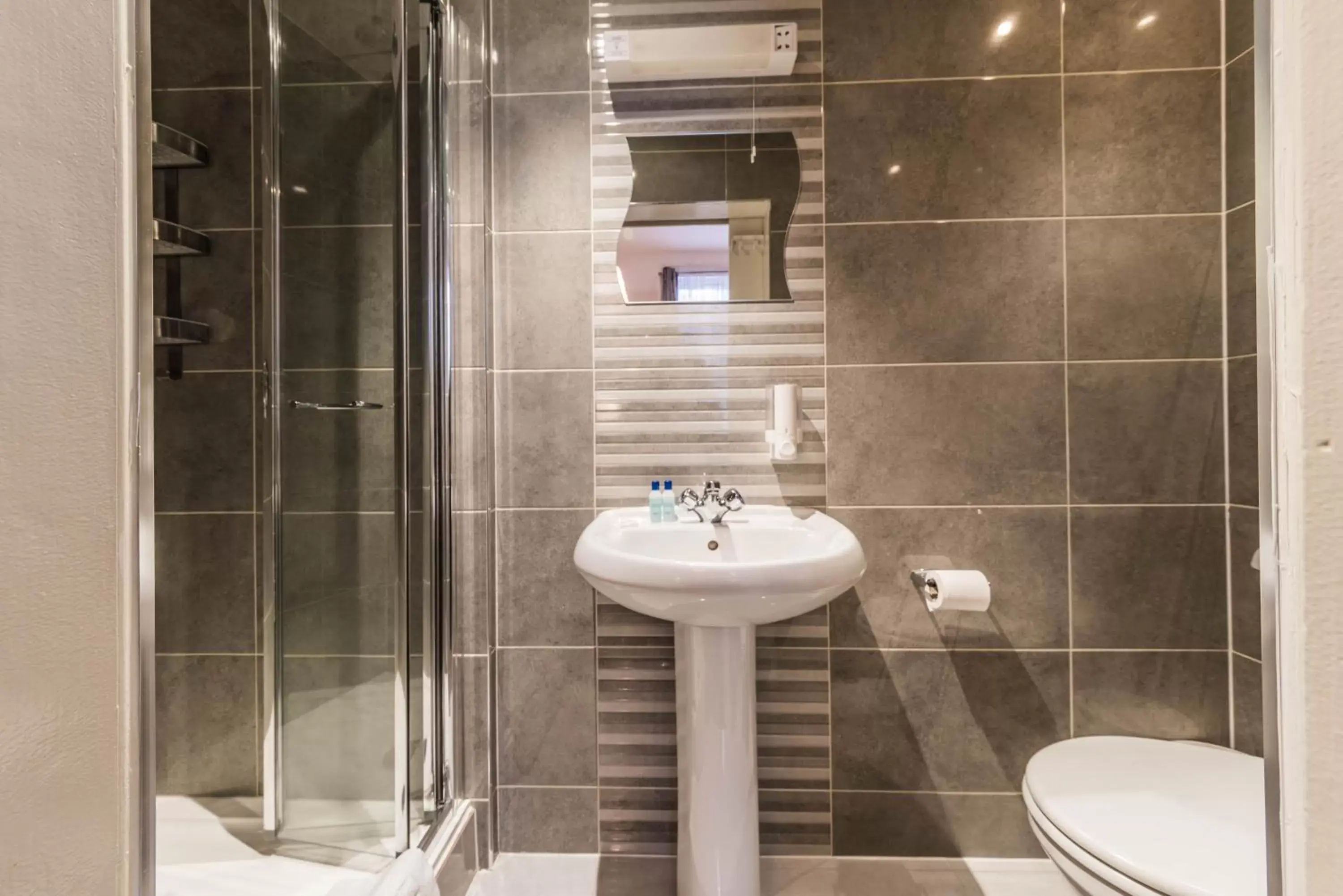 Bathroom in Hellenic Hotel by Saba