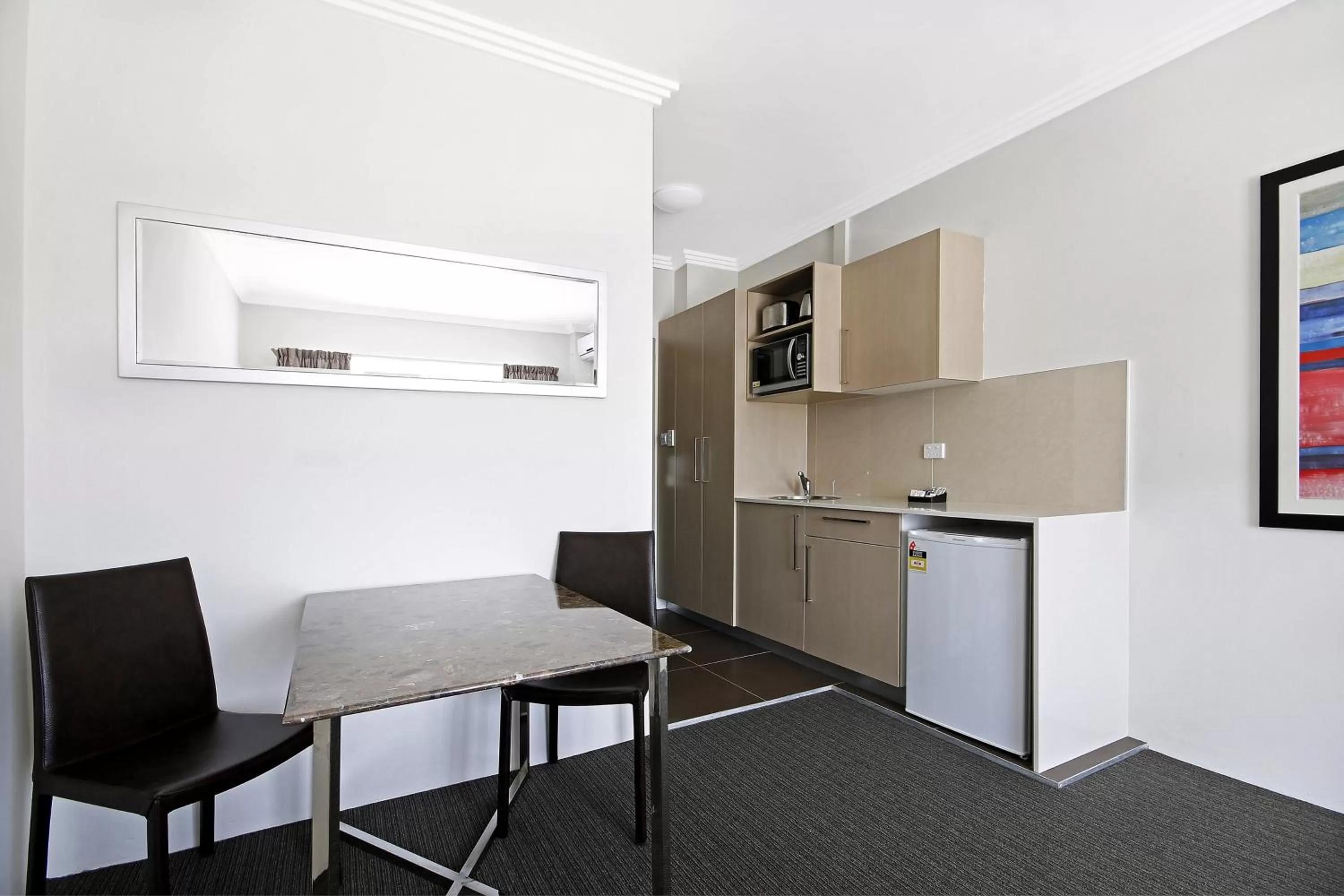 Kitchen or kitchenette in Value Suites Penrith