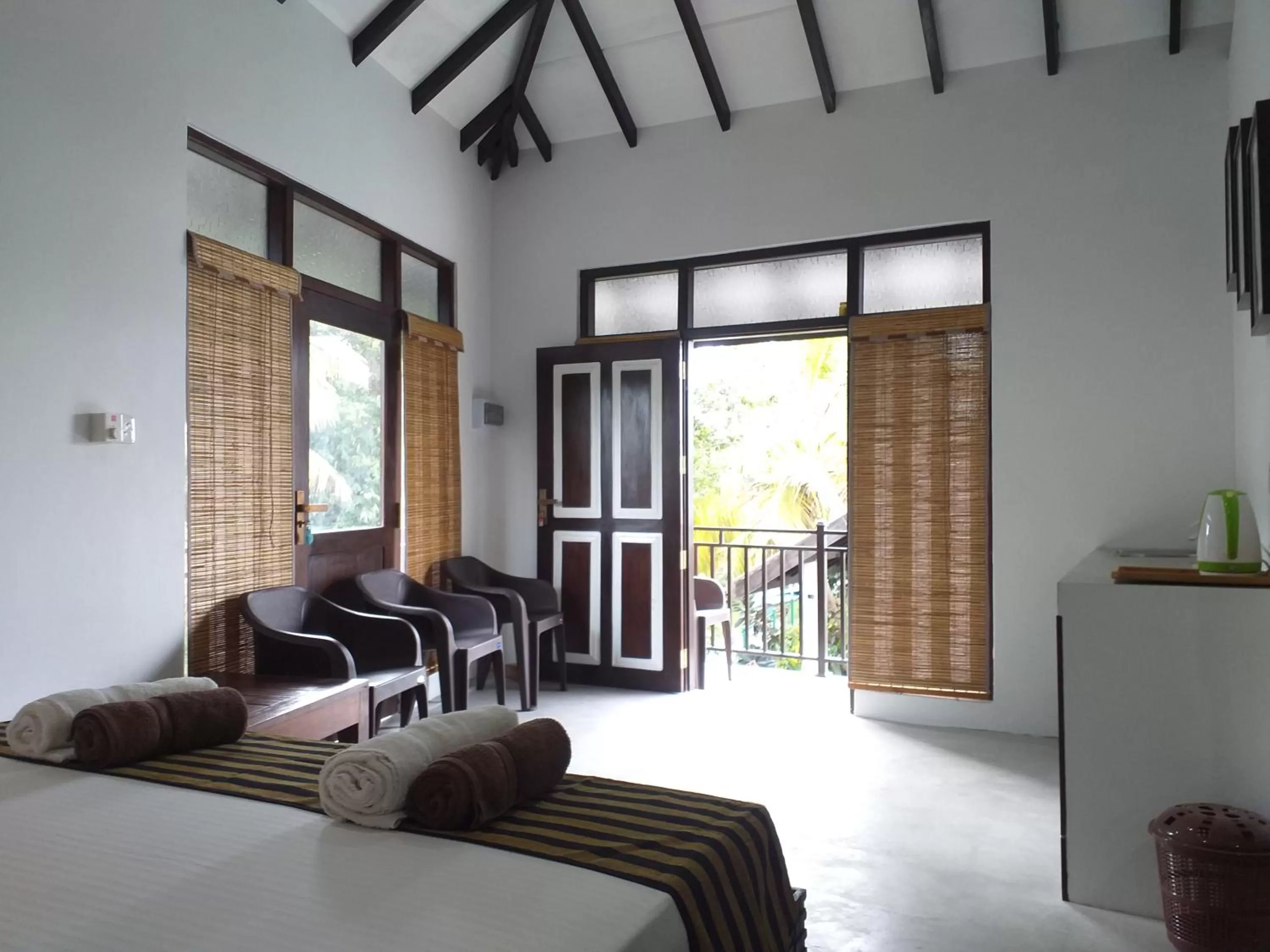 Seating area, Bed in Green Wood Villa Negombo