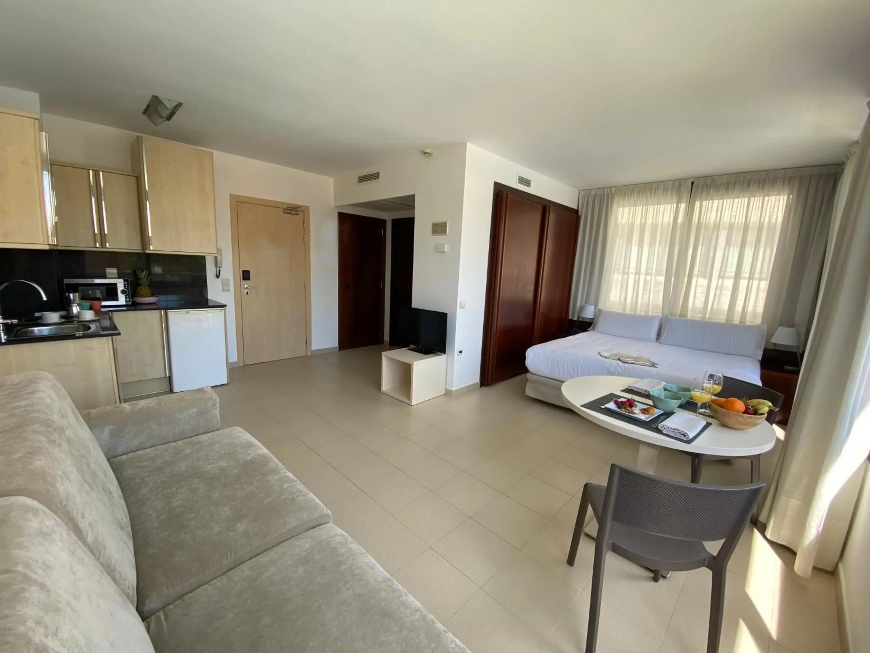 Kitchen/Kitchenette in Atenea Park Suites & Apartments