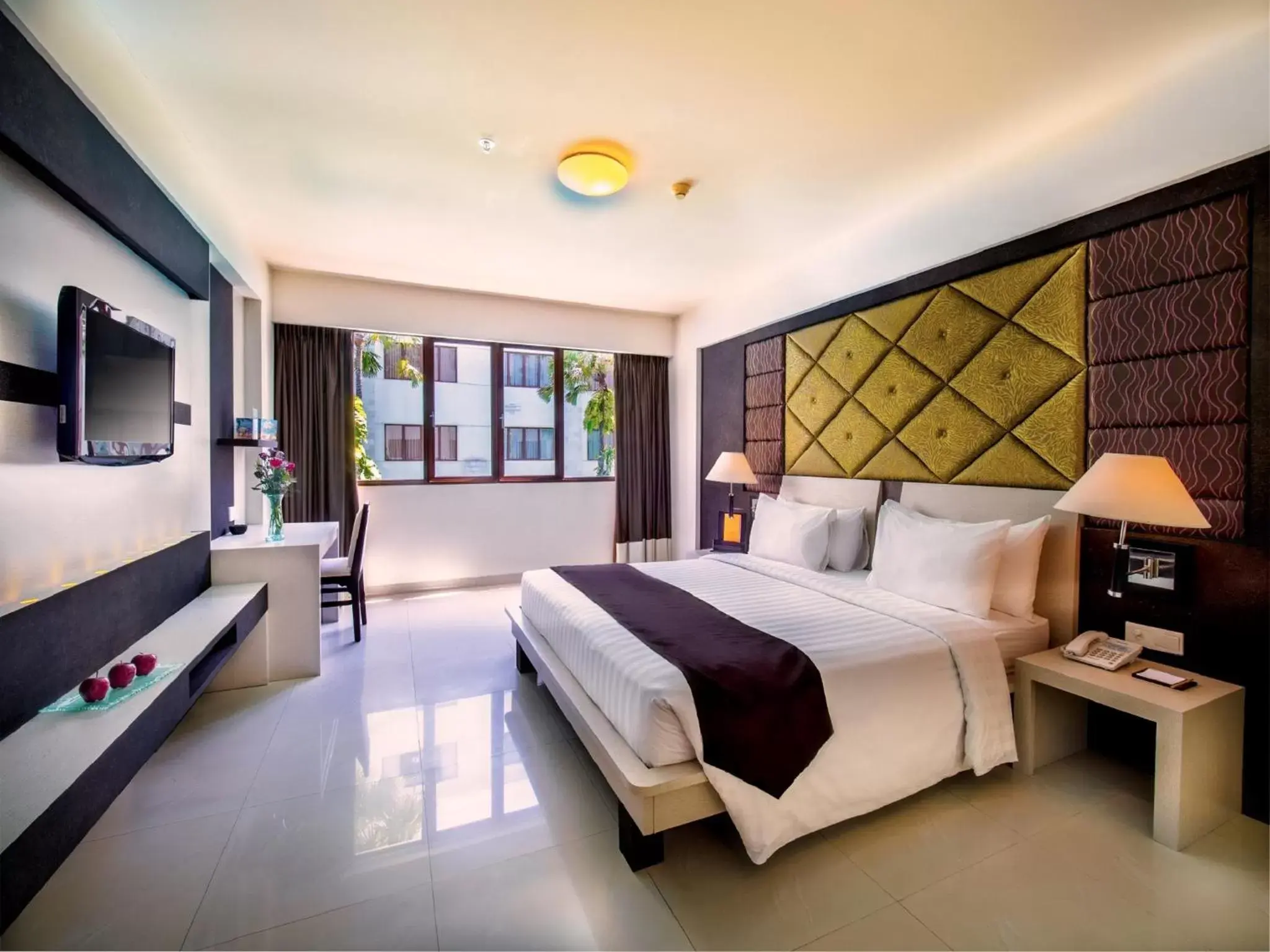 Bedroom in ASTON Kuta Hotel and Residence