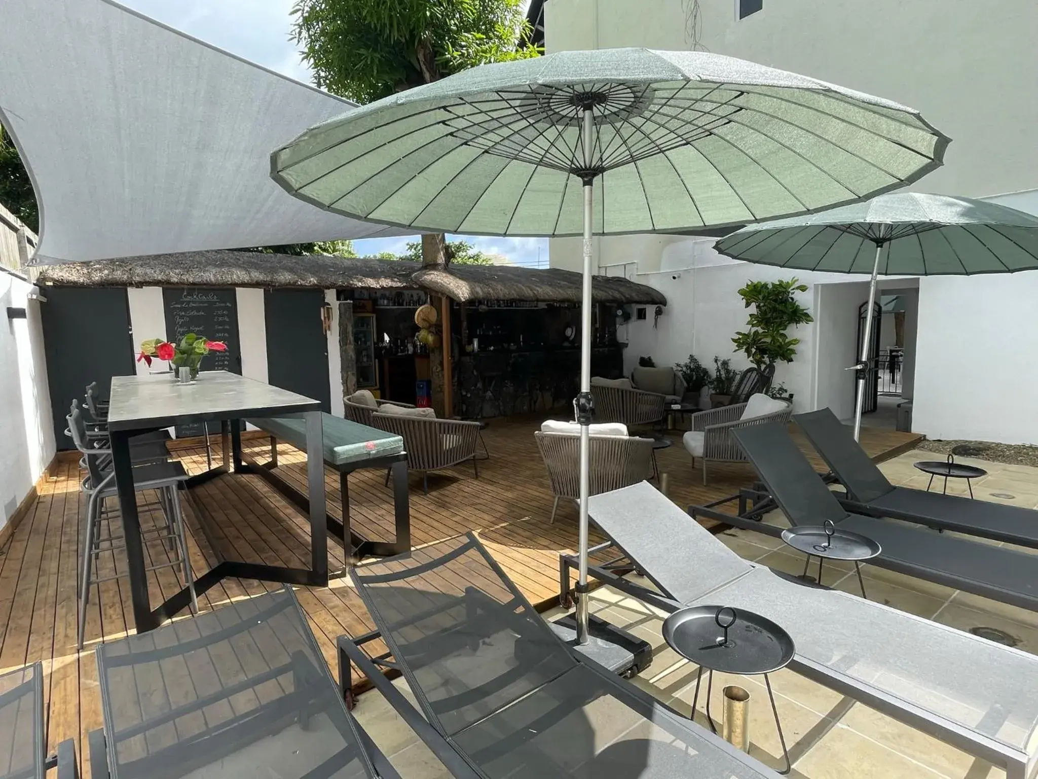 Lounge or bar in Sous Le Badamier Guest House Restaurant Bar