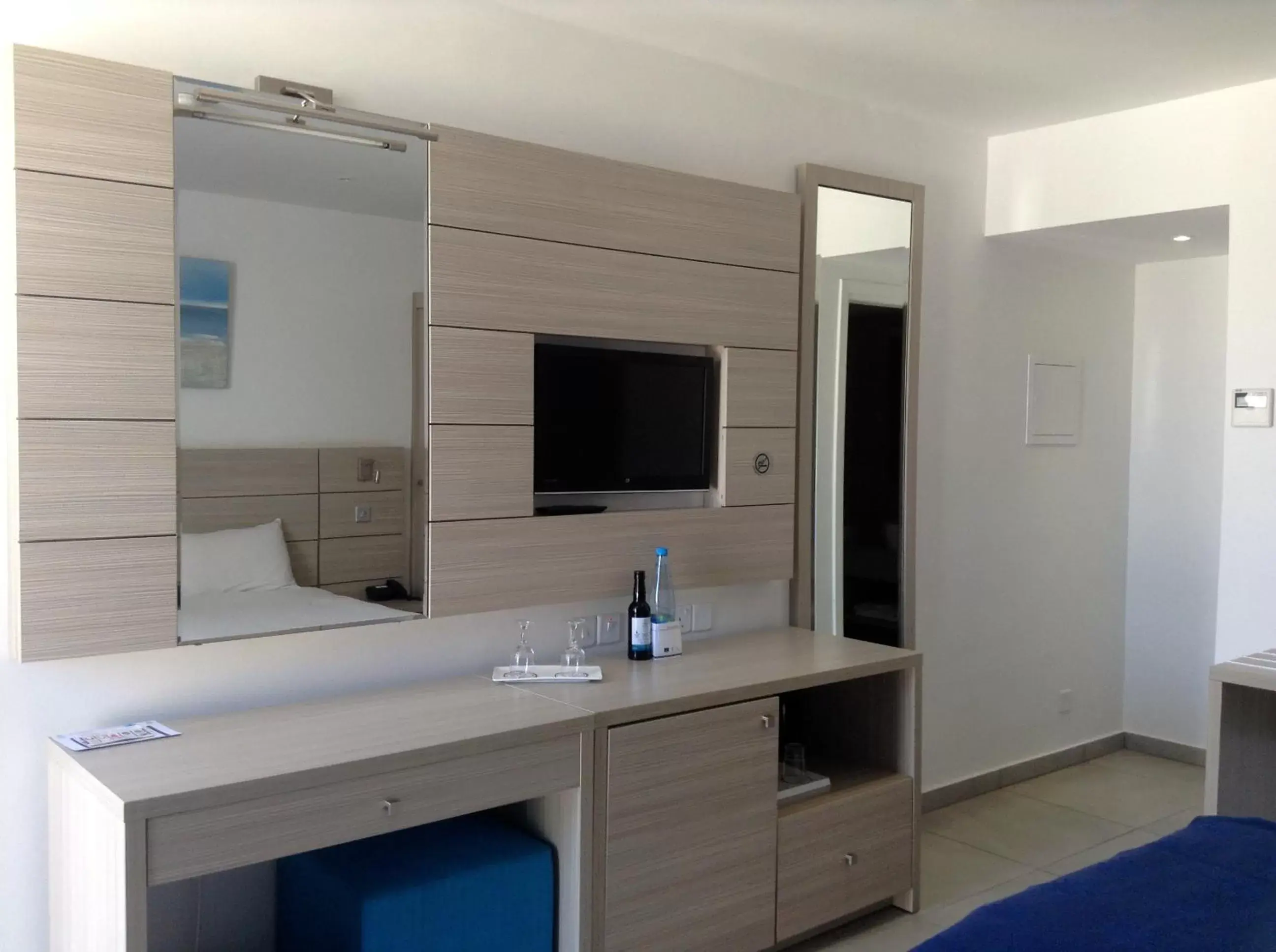 Photo of the whole room, TV/Entertainment Center in Limanaki Beach Hotel & Suites