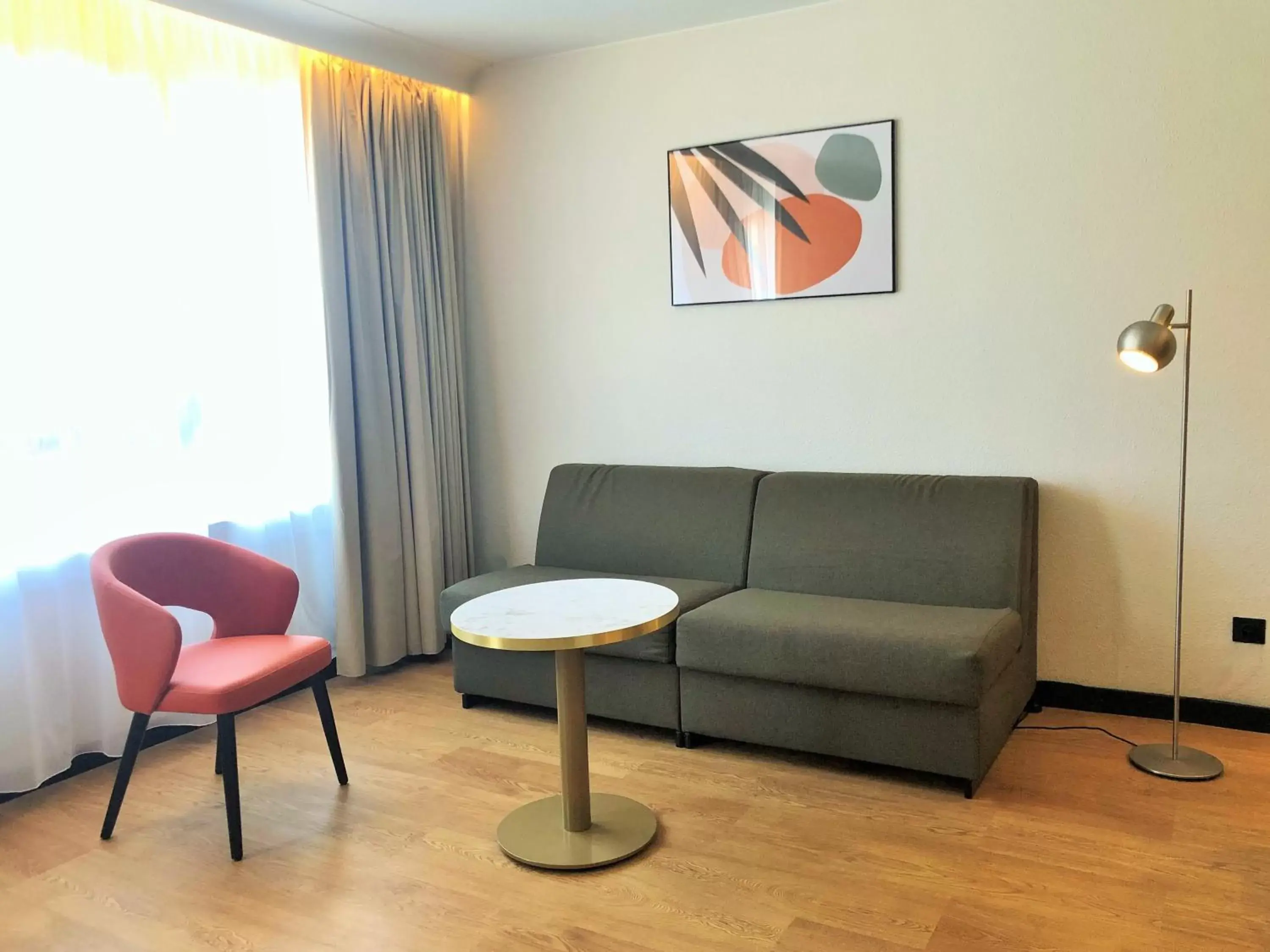 Bed, Seating Area in Novotel Suites Montpellier Antigone