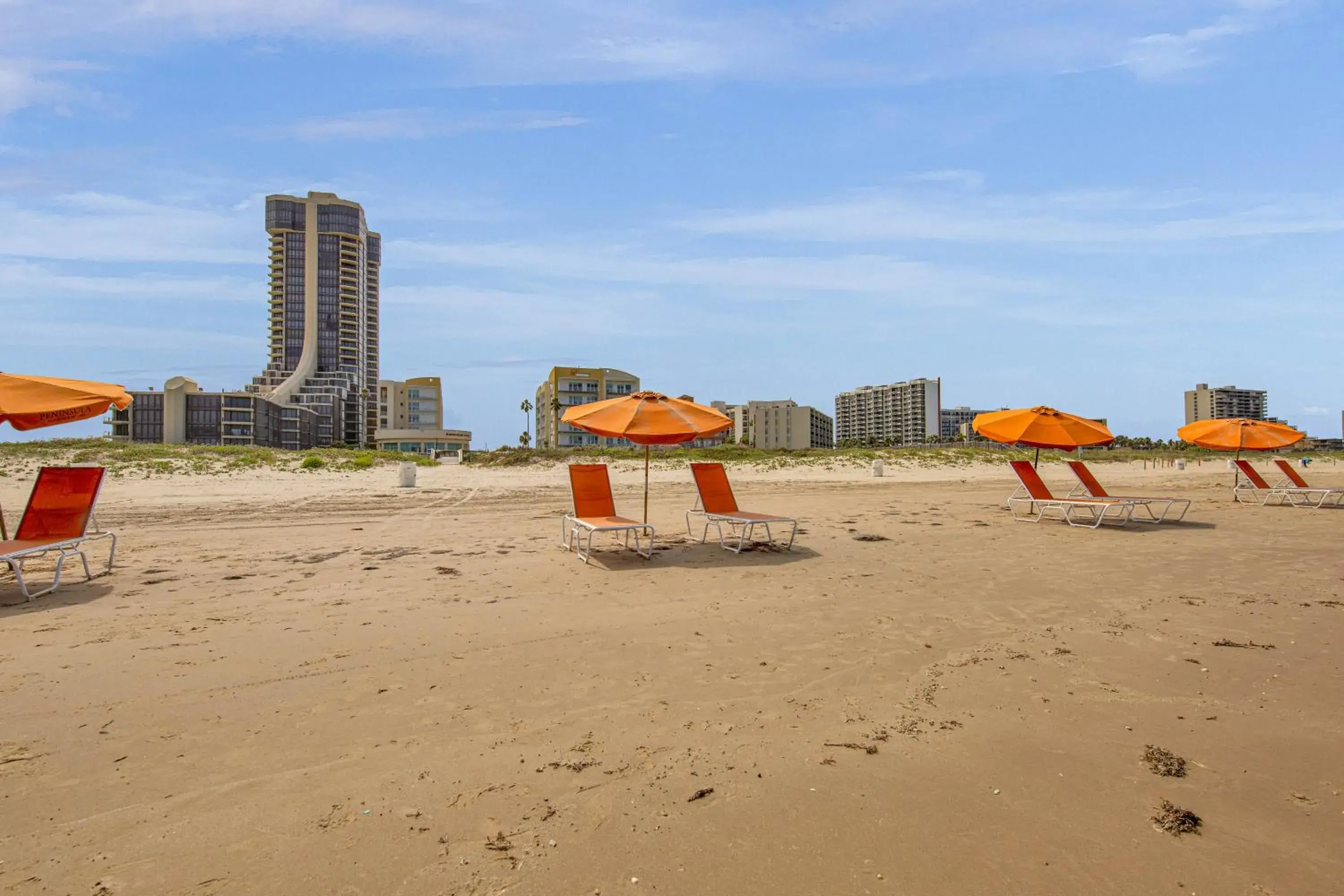 Property building in Peninsula Island Resort & Spa - Beachfront Property at South Padre Island Property building in Peninsula Island Resort & Spa - Beachfront Property at South Padre Island