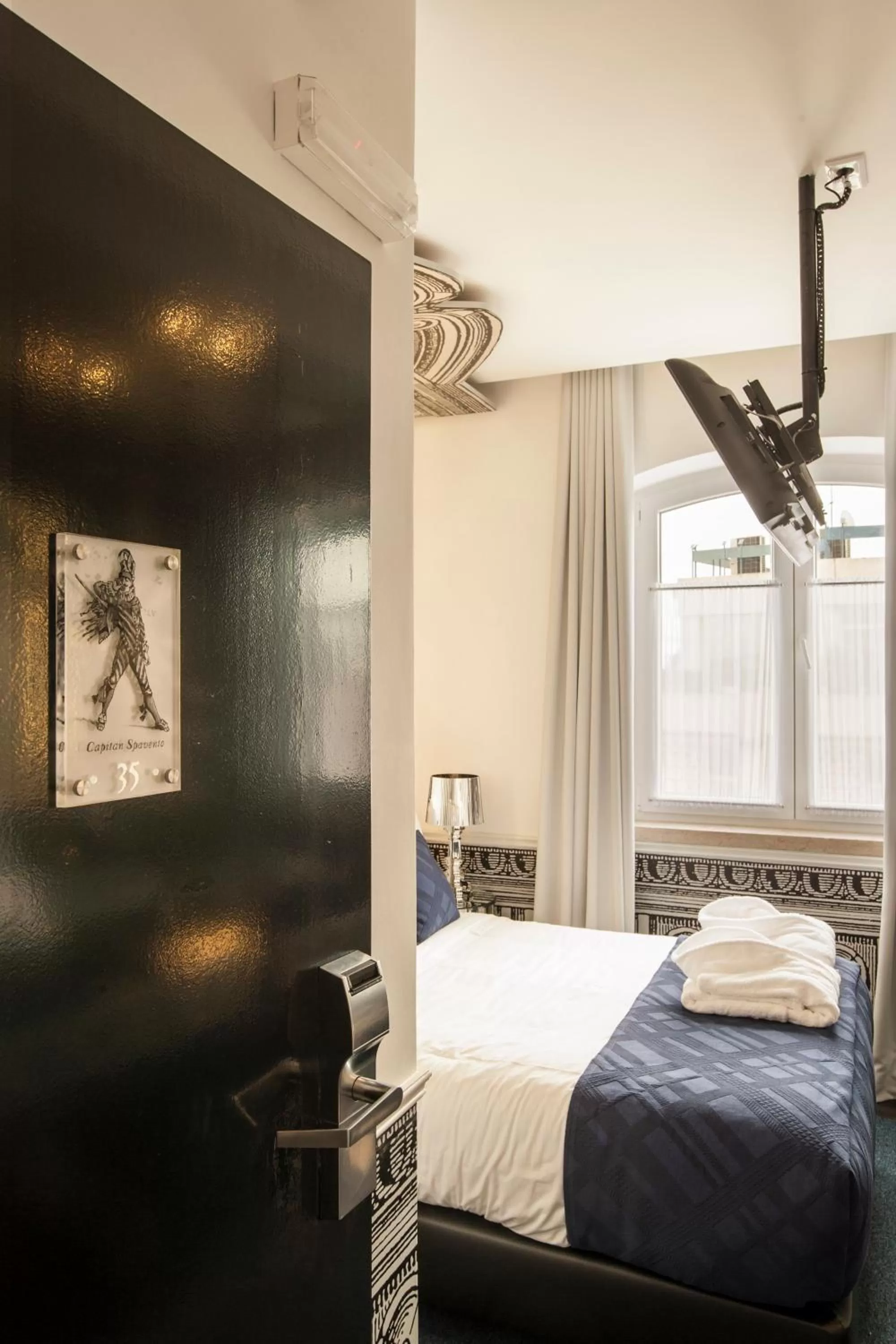 Bed in Teatro Boutique Rooms & Suites