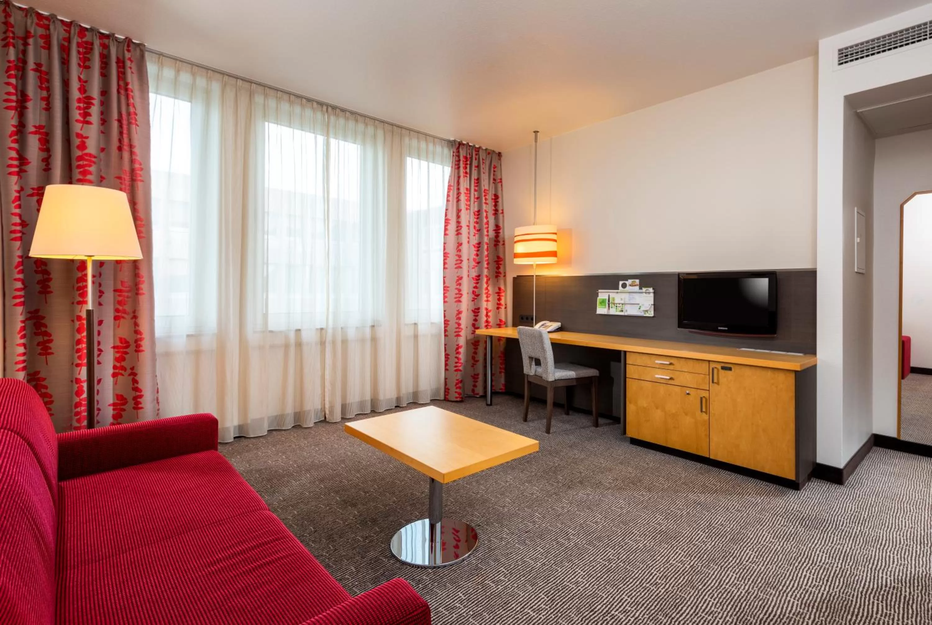 Living room in Holiday Inn Frankfurt Airport - Neu-Isenburg by IHG