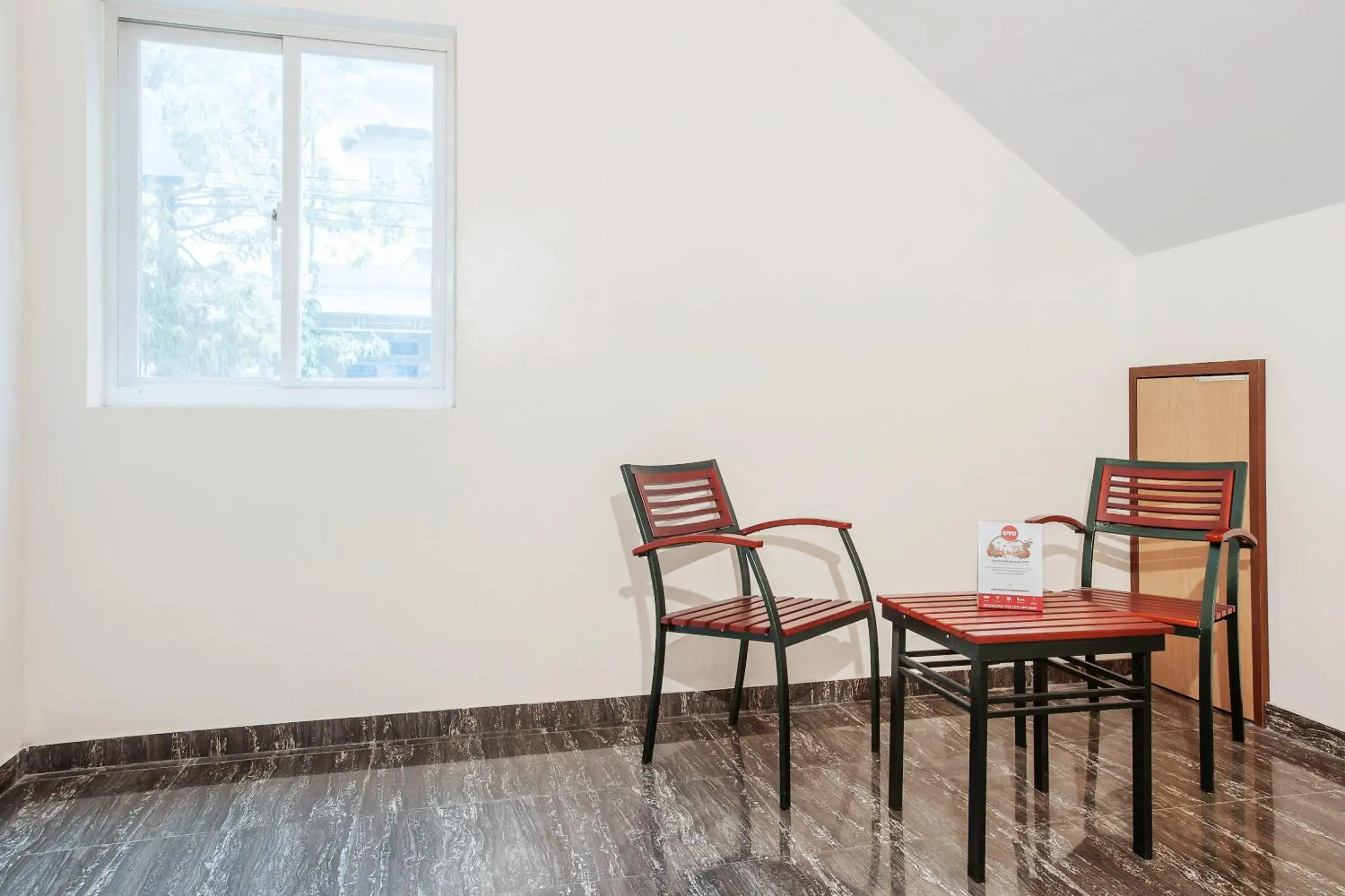 Seating area in OYO 134 LG residence