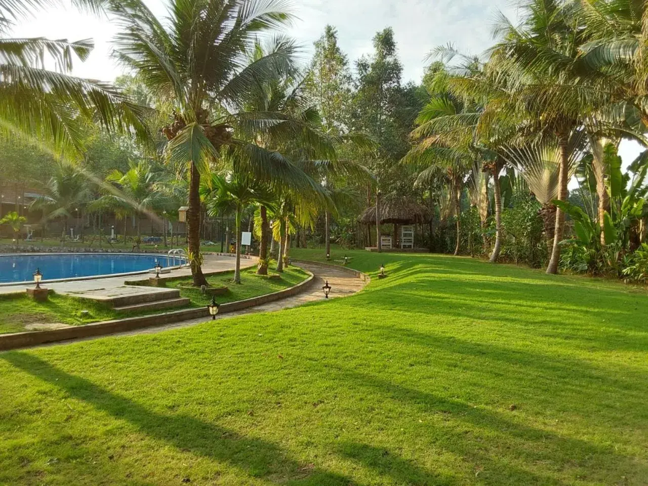 Swimming pool, Garden in The Garden House Phu Quoc Resort