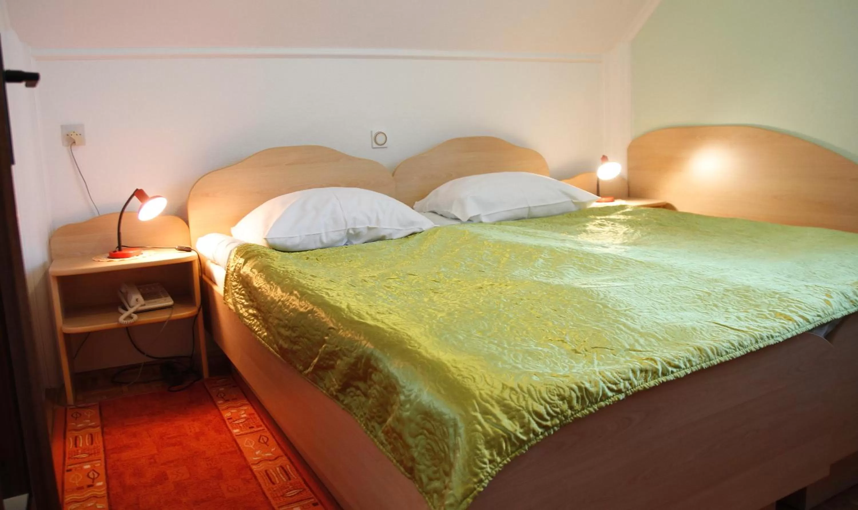 Bed in Rooms & Apartments Jana