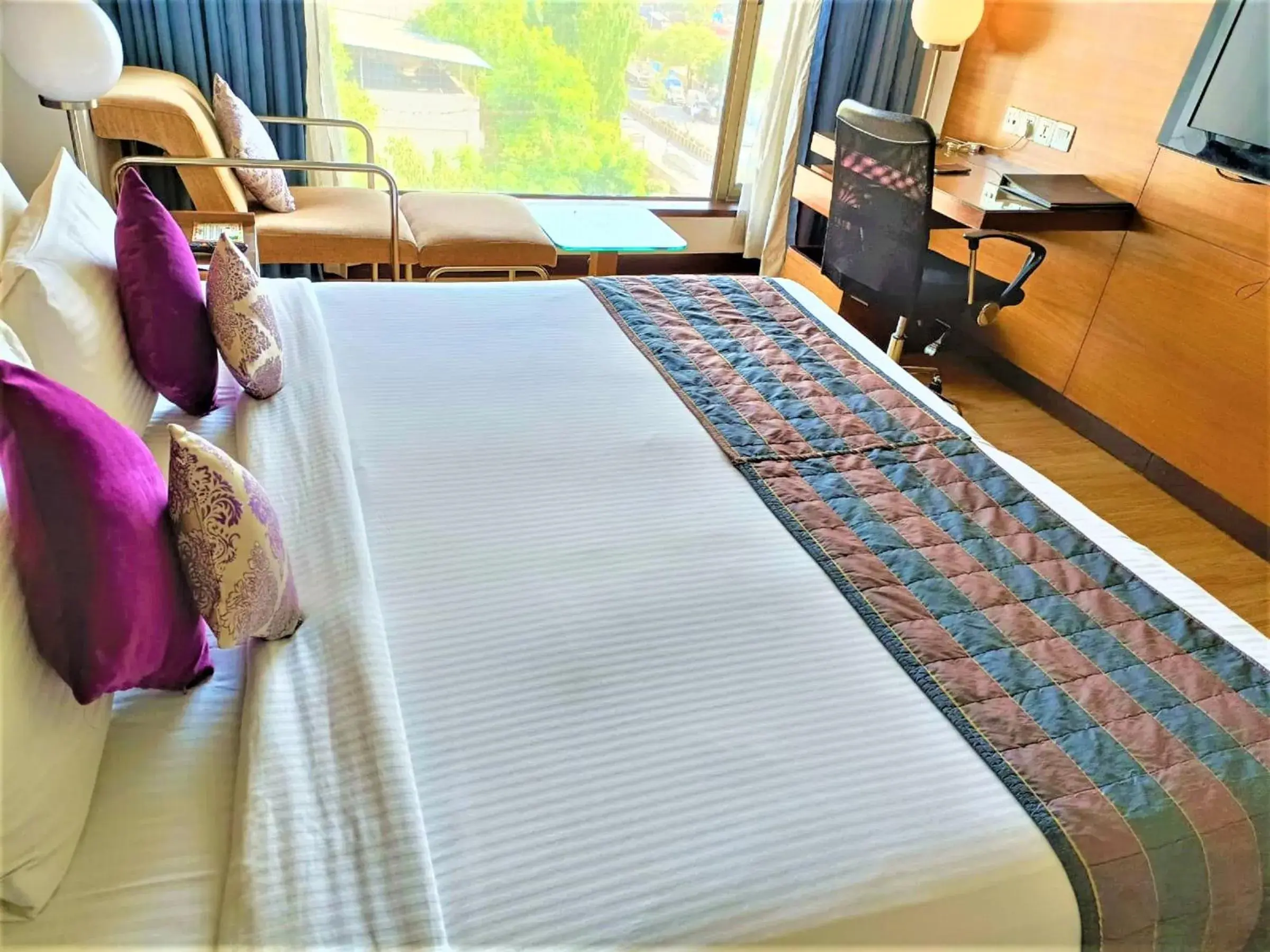 Bed in Hotel Yogi Executive