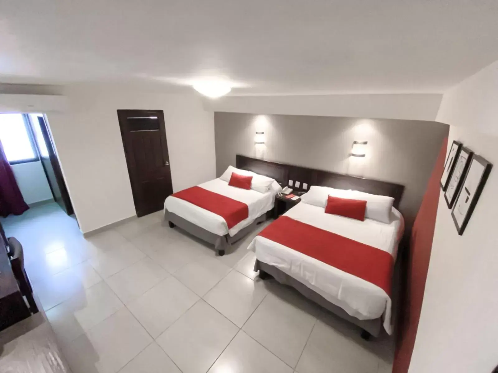 Bedroom, Bed in Ramada Plaza by Wyndham Leon