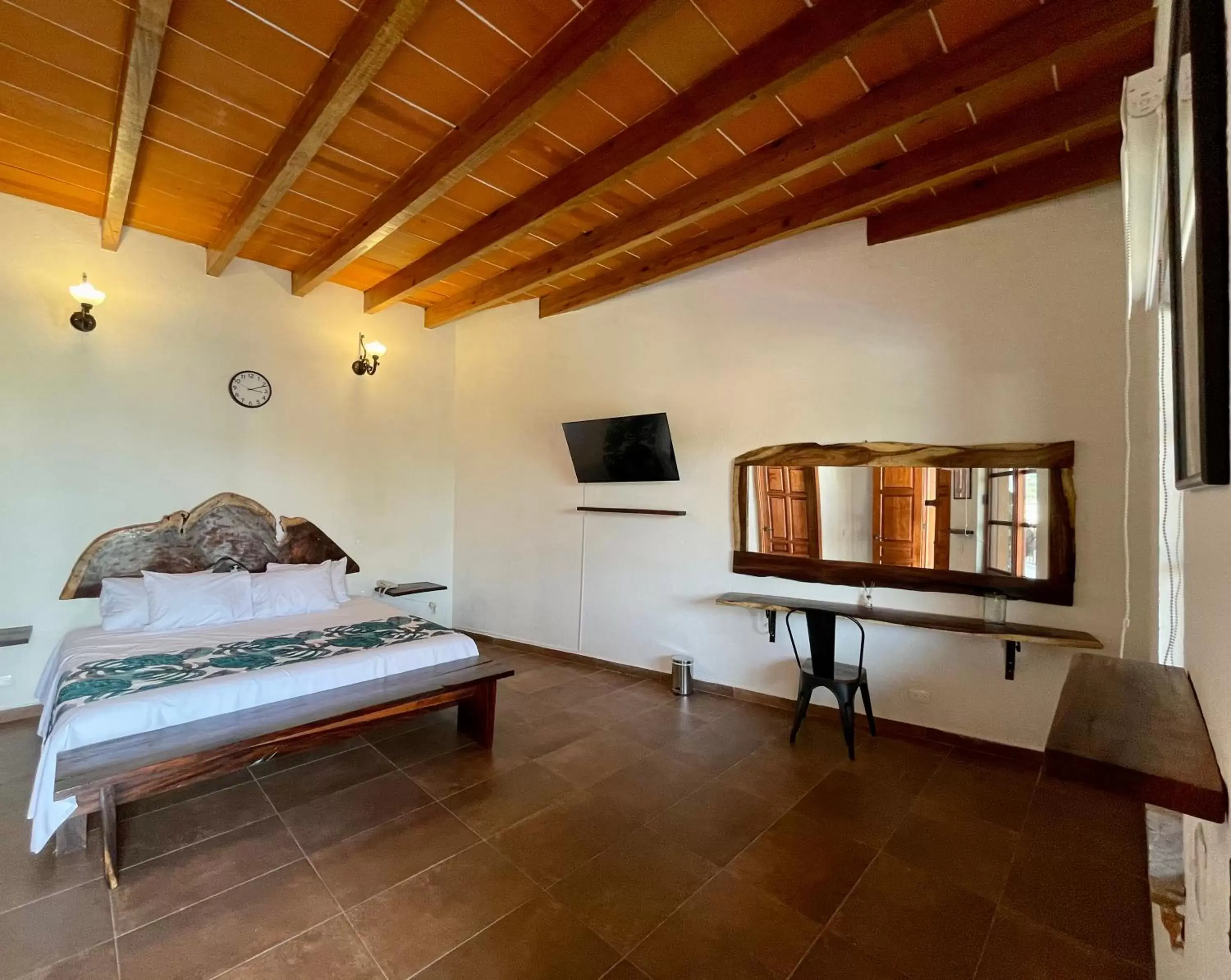Bed, Seating Area in Palacio Del Cobre