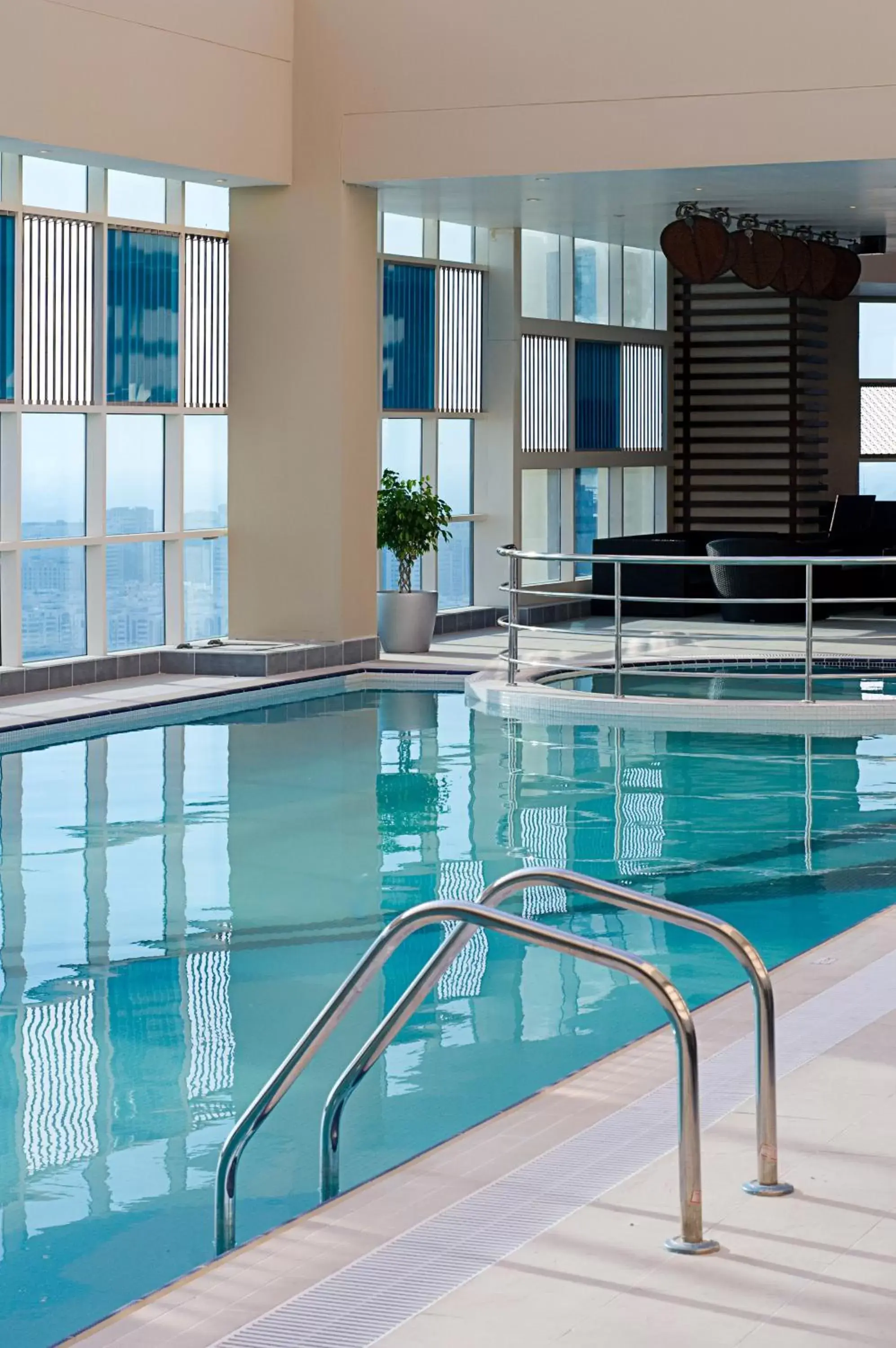 Fitness centre/facilities, Swimming Pool in Grand Millennium Al Wahda Hotel and Executive Apartments Abu Dhabi