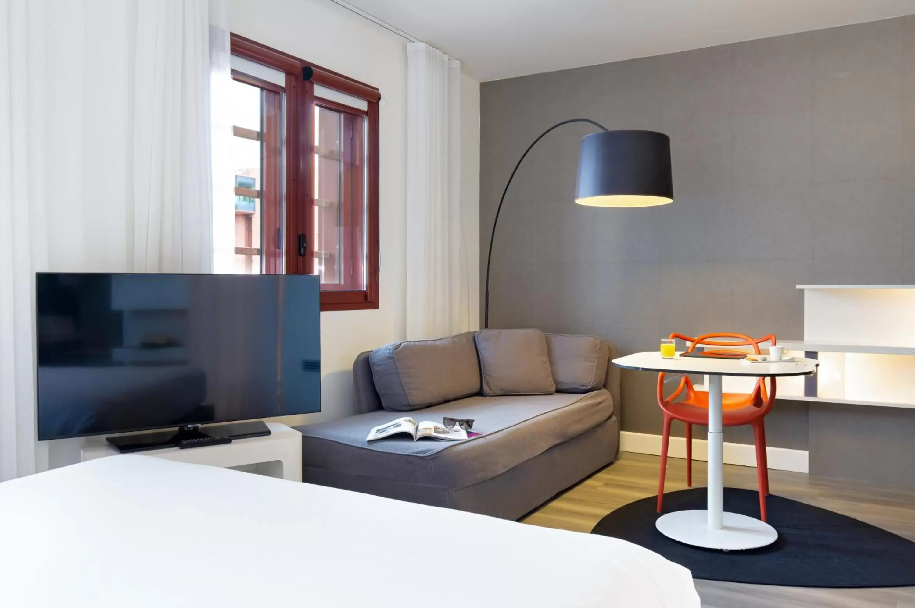 Bedroom, Seating Area in Novotel Suites Perpignan Centre