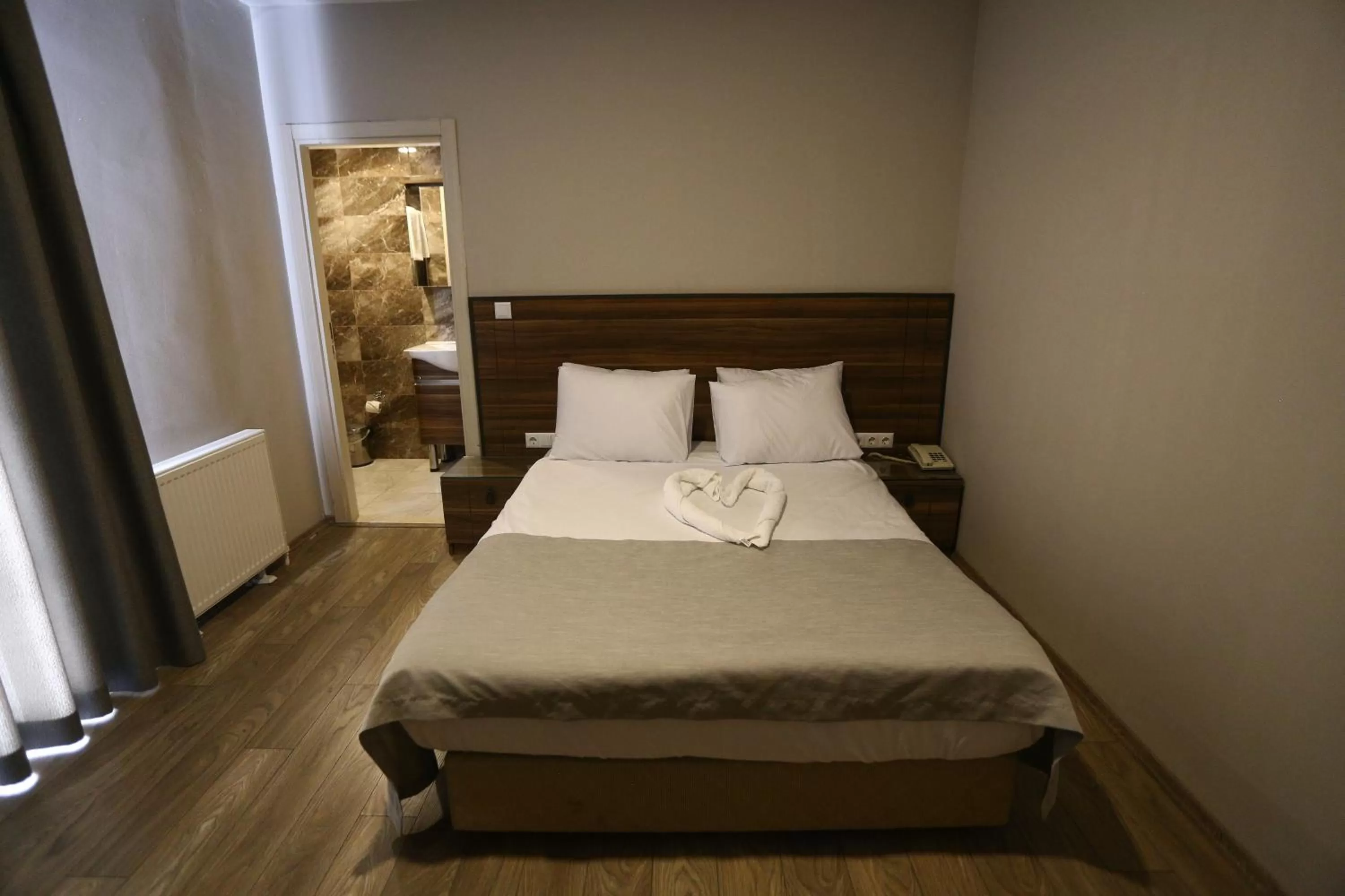 Bed in Albatros Premier Hotel