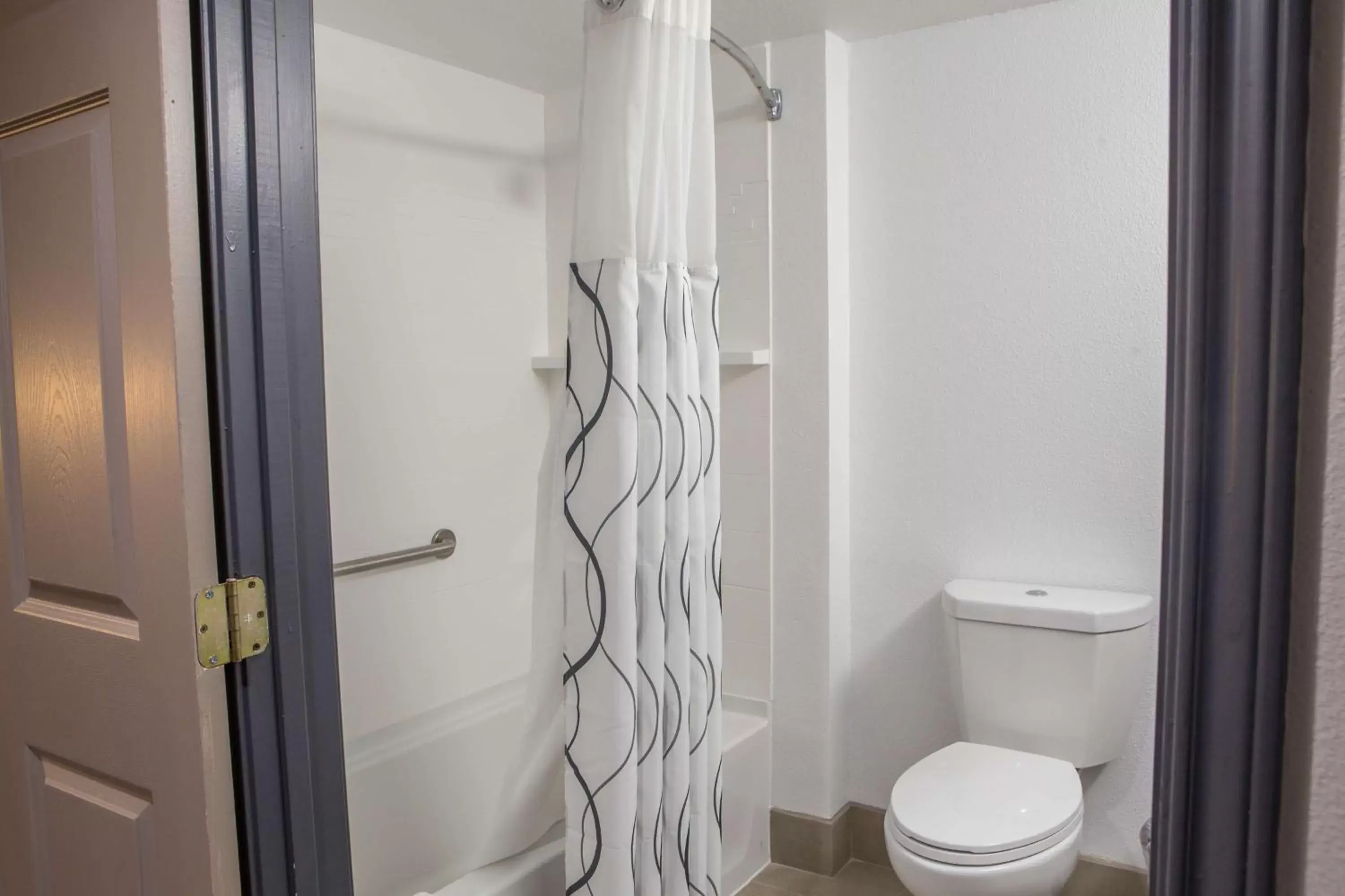 Bathroom in Country Inn & Suites by Radisson, Harlingen, TX