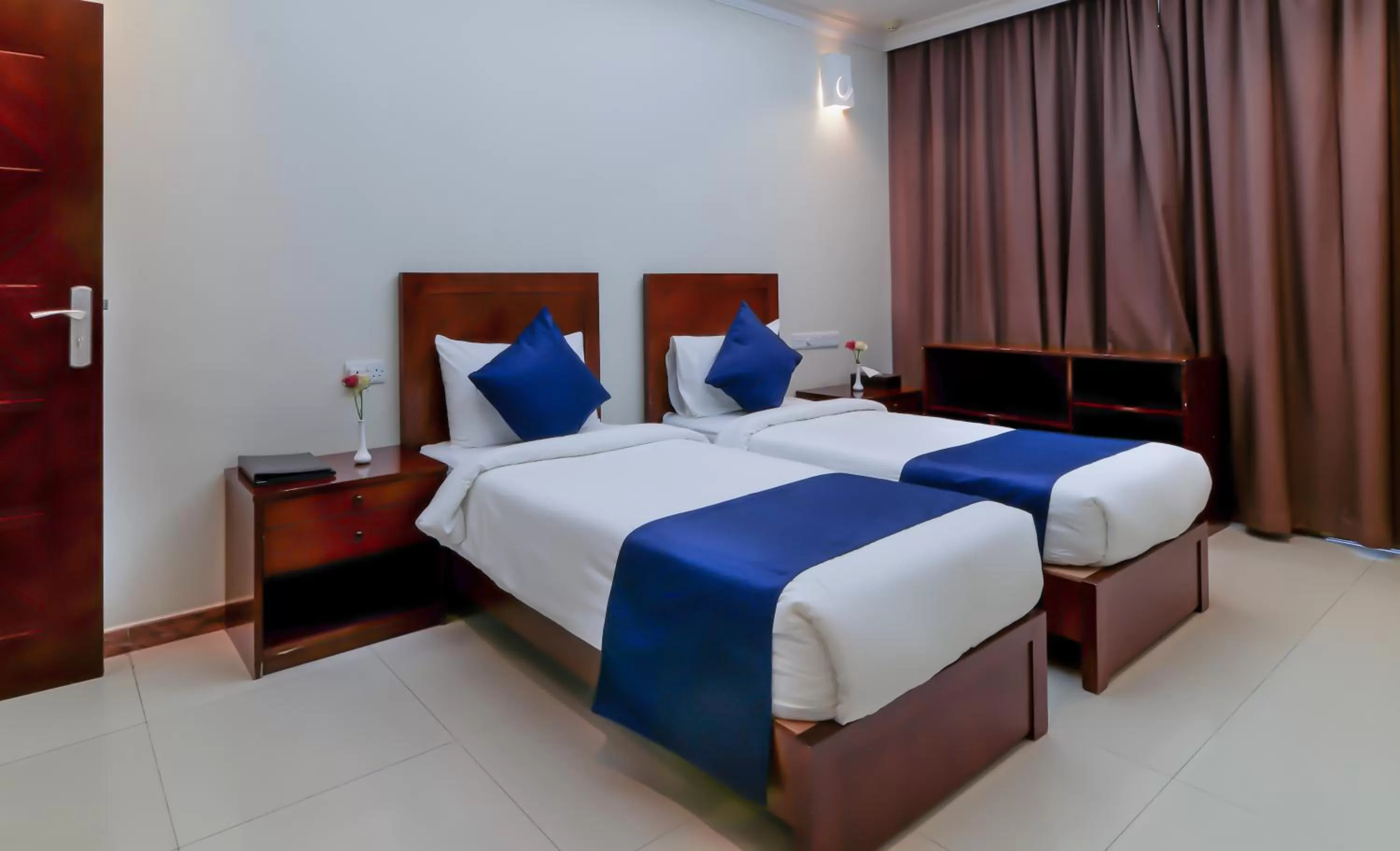Bedroom, Bed in Tanzanite Executive Suites