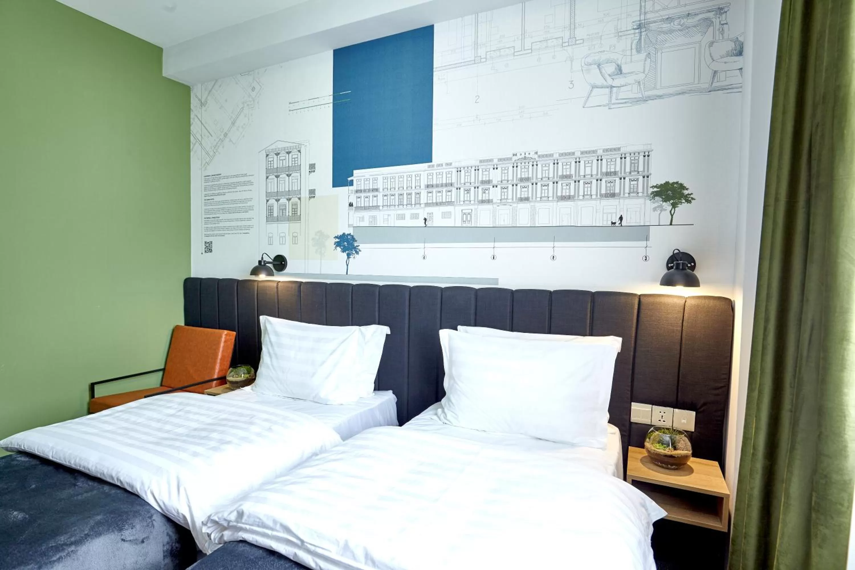 Bed in Graphica Tbilisi Hotel