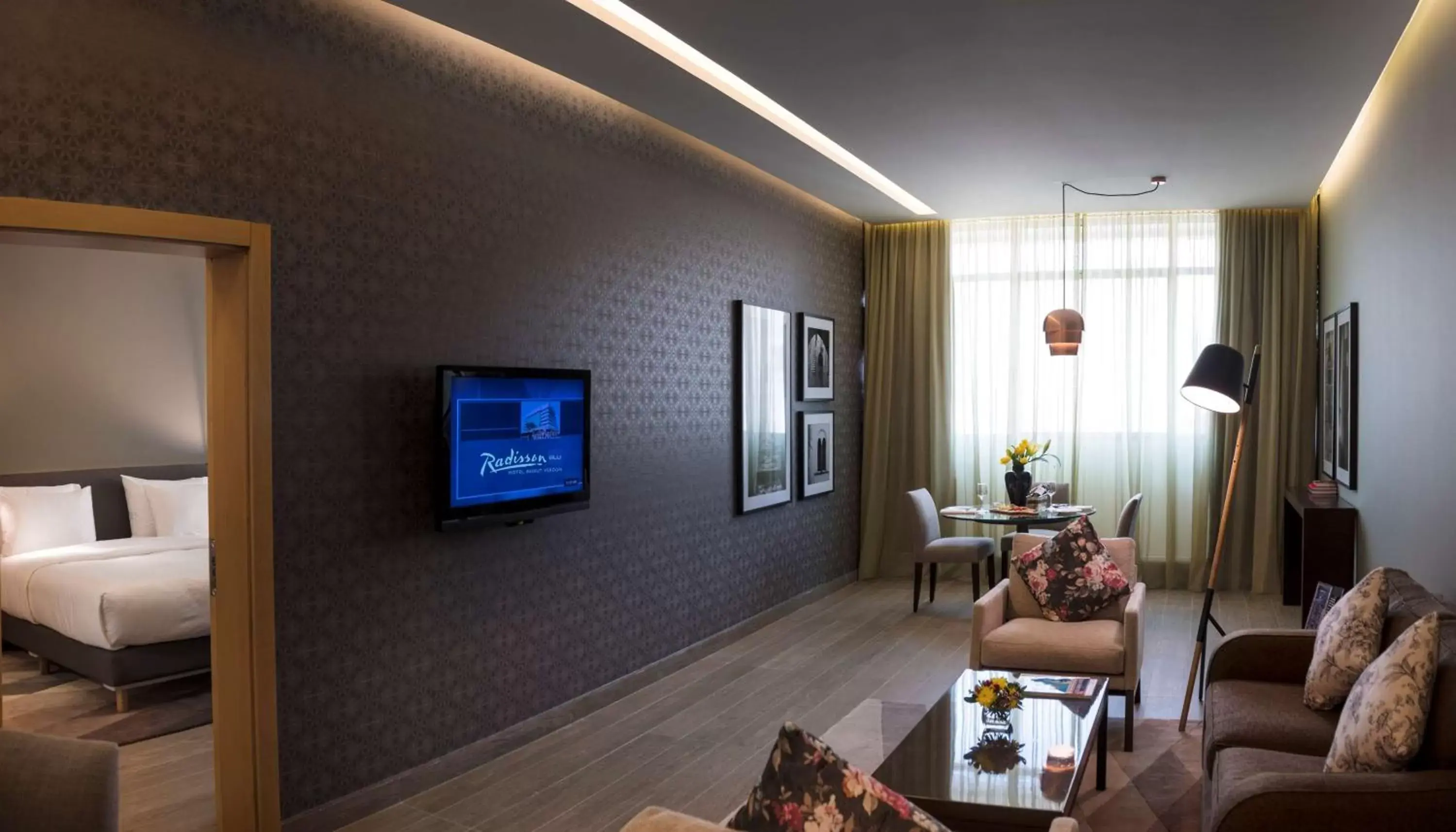 Photo of the whole room, TV/Entertainment Center in Radisson Blu Hotel, Beirut Verdun