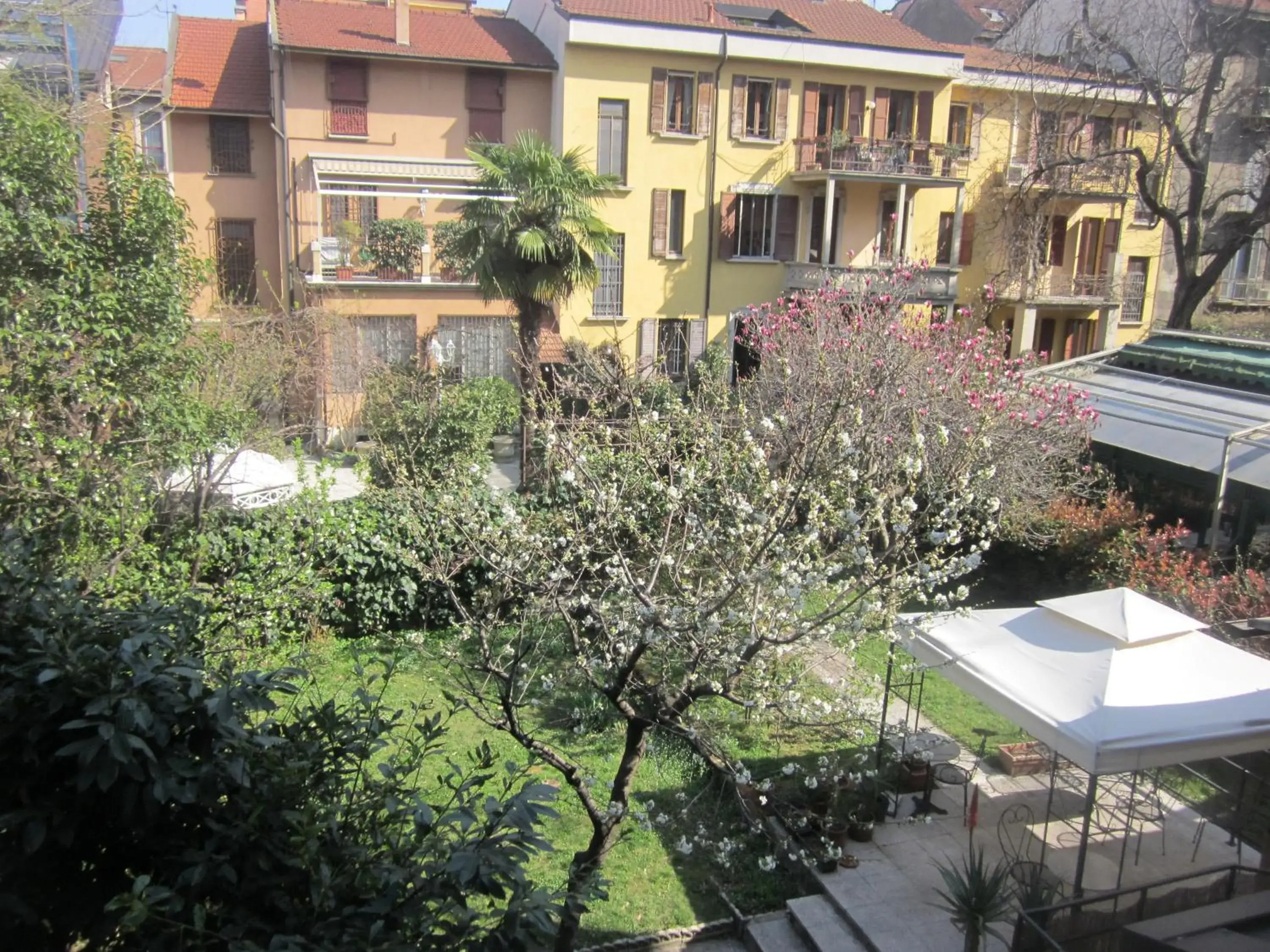 Garden, Property Building in Hotel Adler