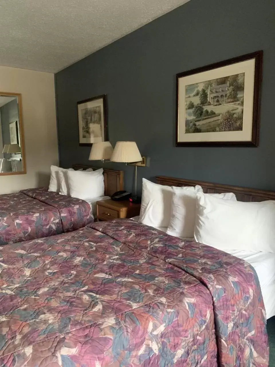 Bed in Bancroft Inn & Suites
