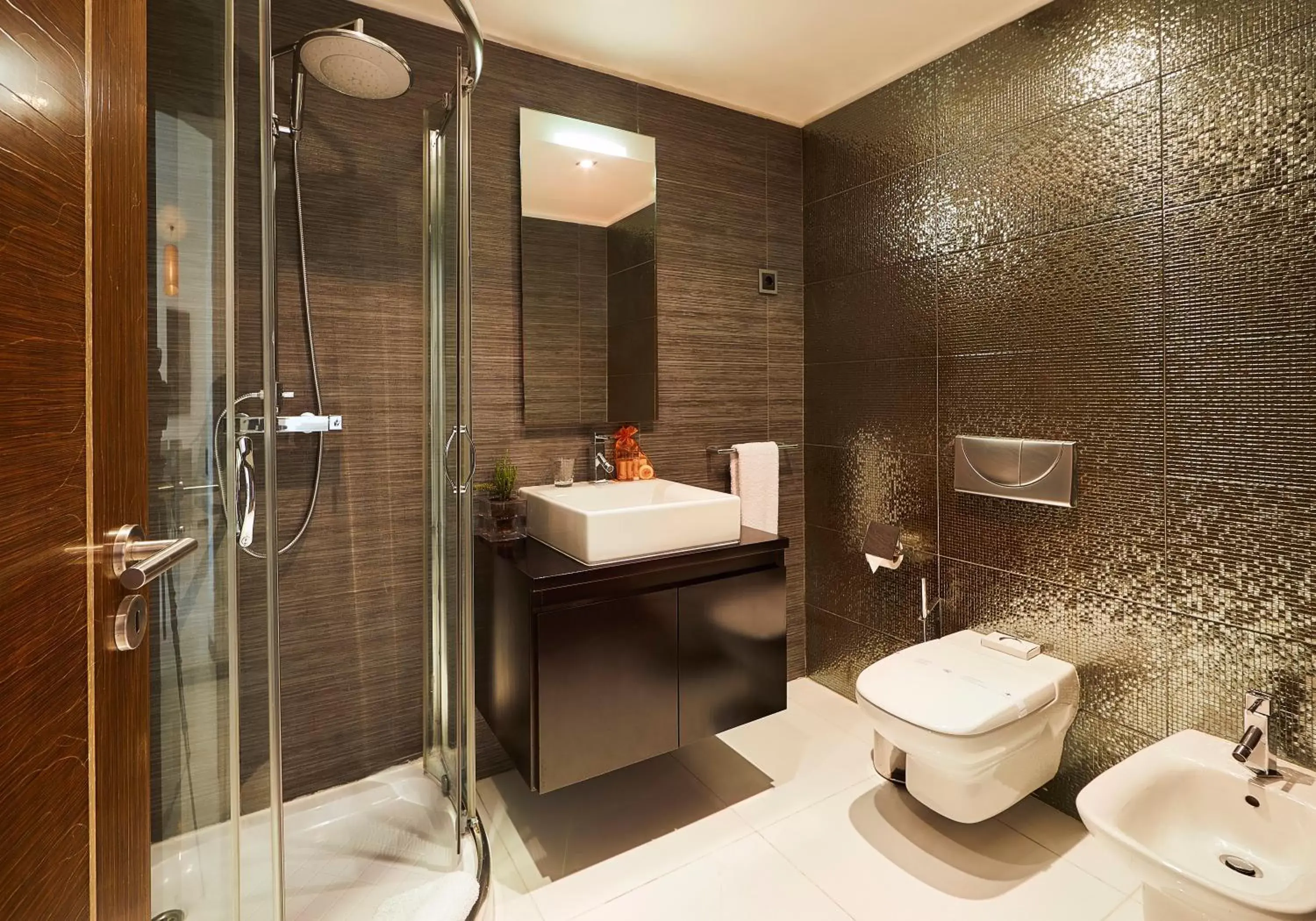 Bathroom in RK Suite Hotel