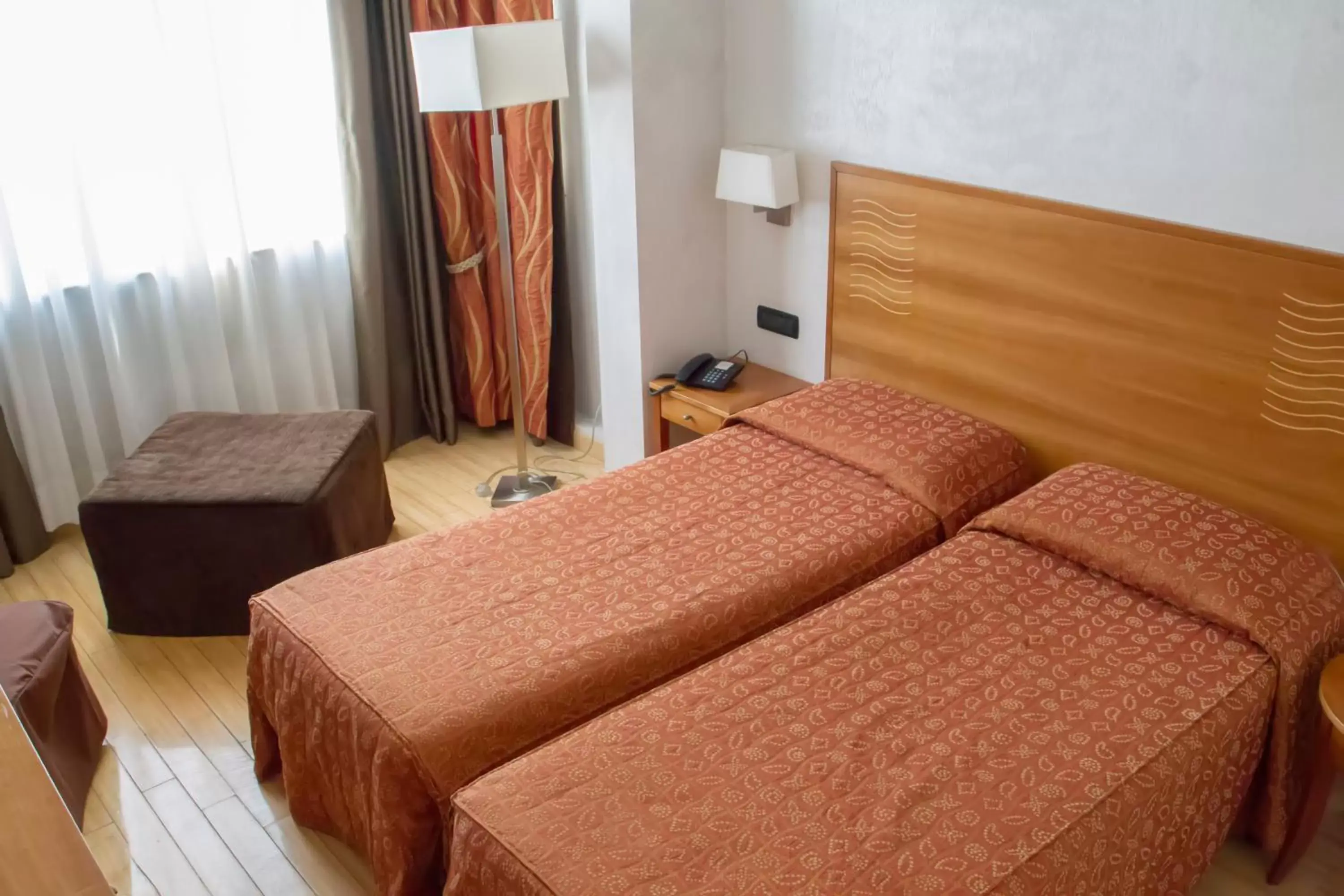 Bed in Hotel Continental Bed in Hotel Continental