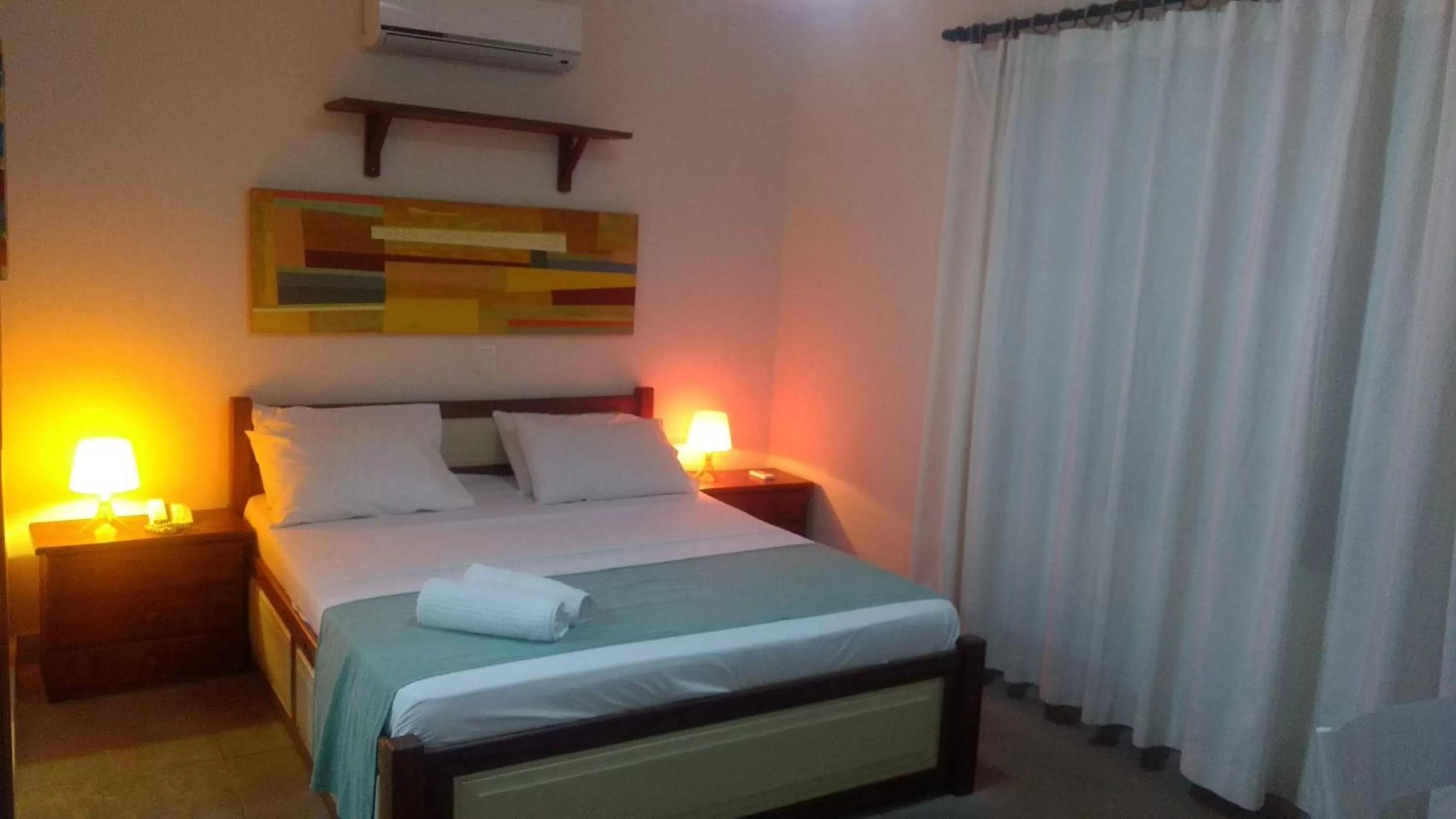 Bed in Hotel Pousada Salvador Paradise