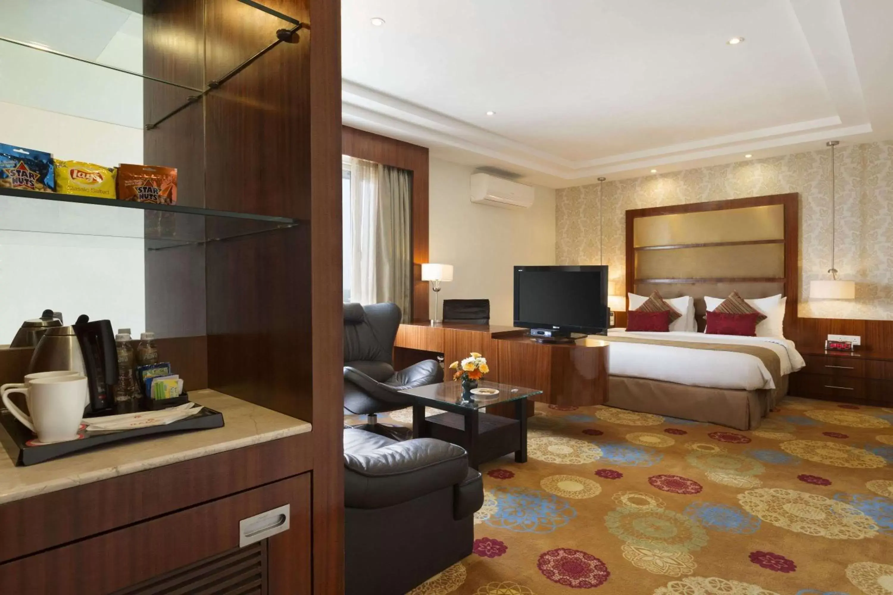 Photo of the whole room, Bed in Ramada Ahmedabad Photo of the whole room, Bed in Ramada Ahmedabad